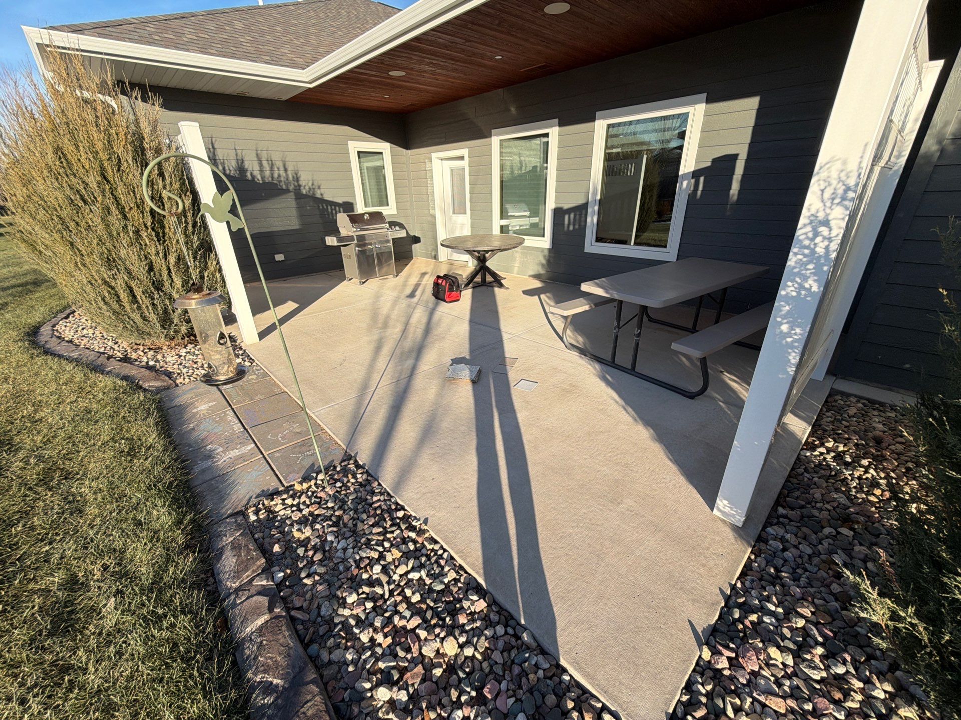 Polyurea Patio Floor Coating in Starry Evening for Sioux Falls Home by Select Painting, Coatings & Garage Cabinets