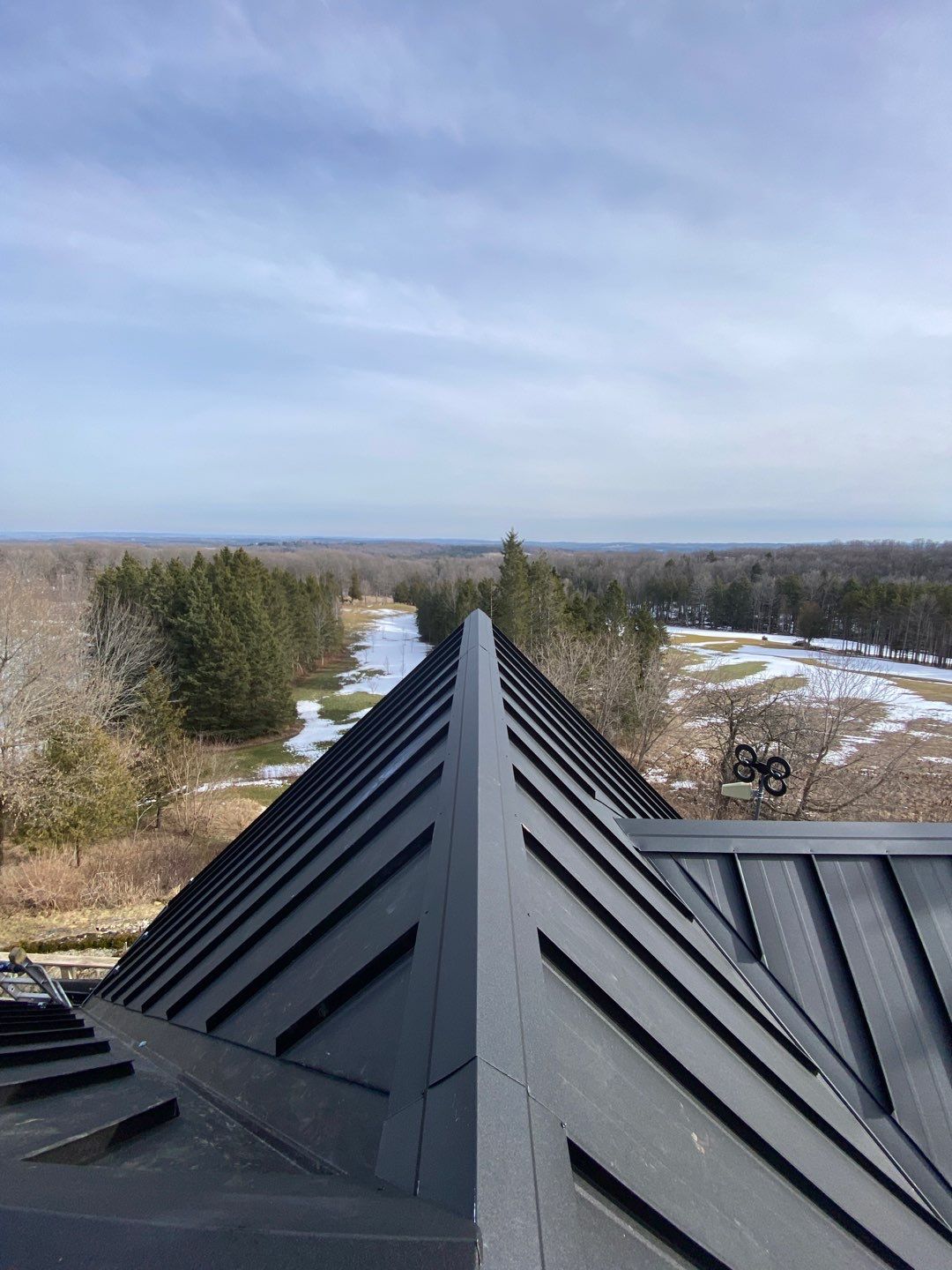 Residential Roofing Installation using 24 Ga Standing Seam Metal by Jay Carter Roofing & Sheet Metal