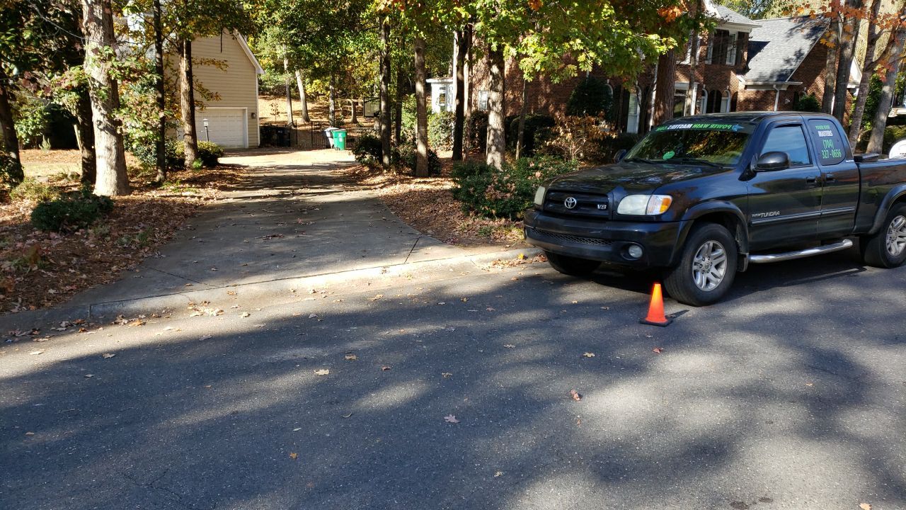 Driveway Clean using cleaner by Power Wash Masters LLC