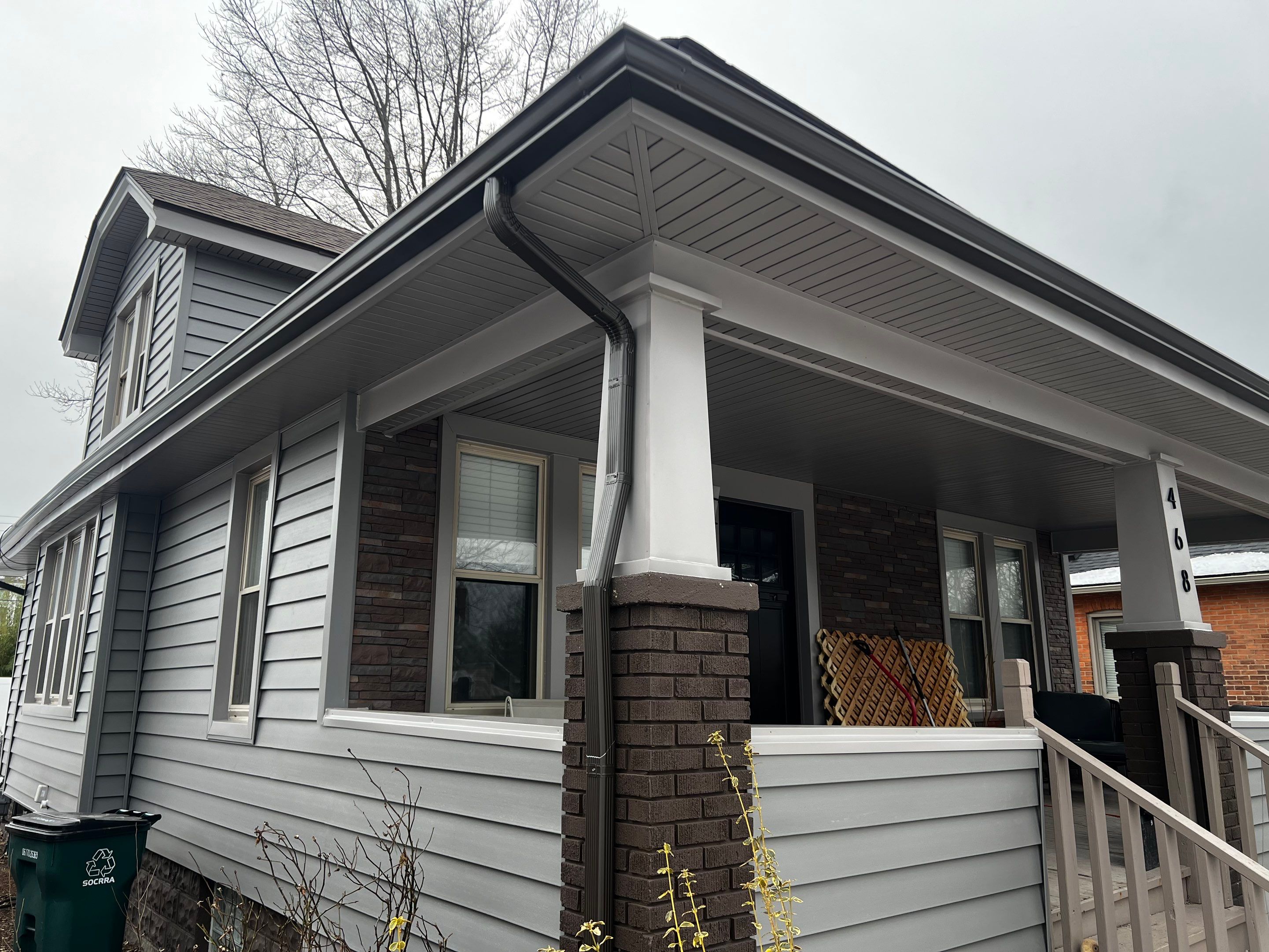 Vinyl Siding Replacement by Bloomfield Construction & Restoration