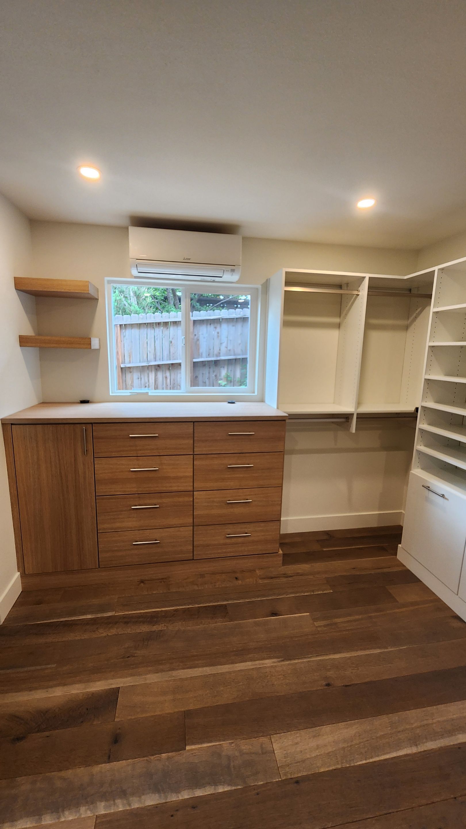 Two-Tone Walk-In Closet in Boulder by Concept 32, Inc.