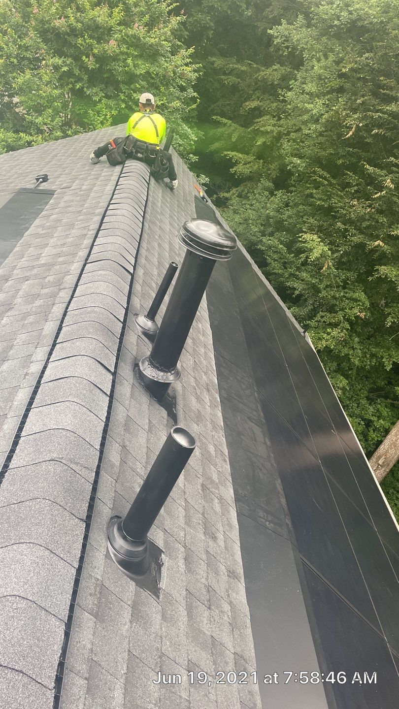 Exterior Home Makeover using GAF Timberline HDZ, GAF Decotech, and James Hardie Siding by American Home Contractors