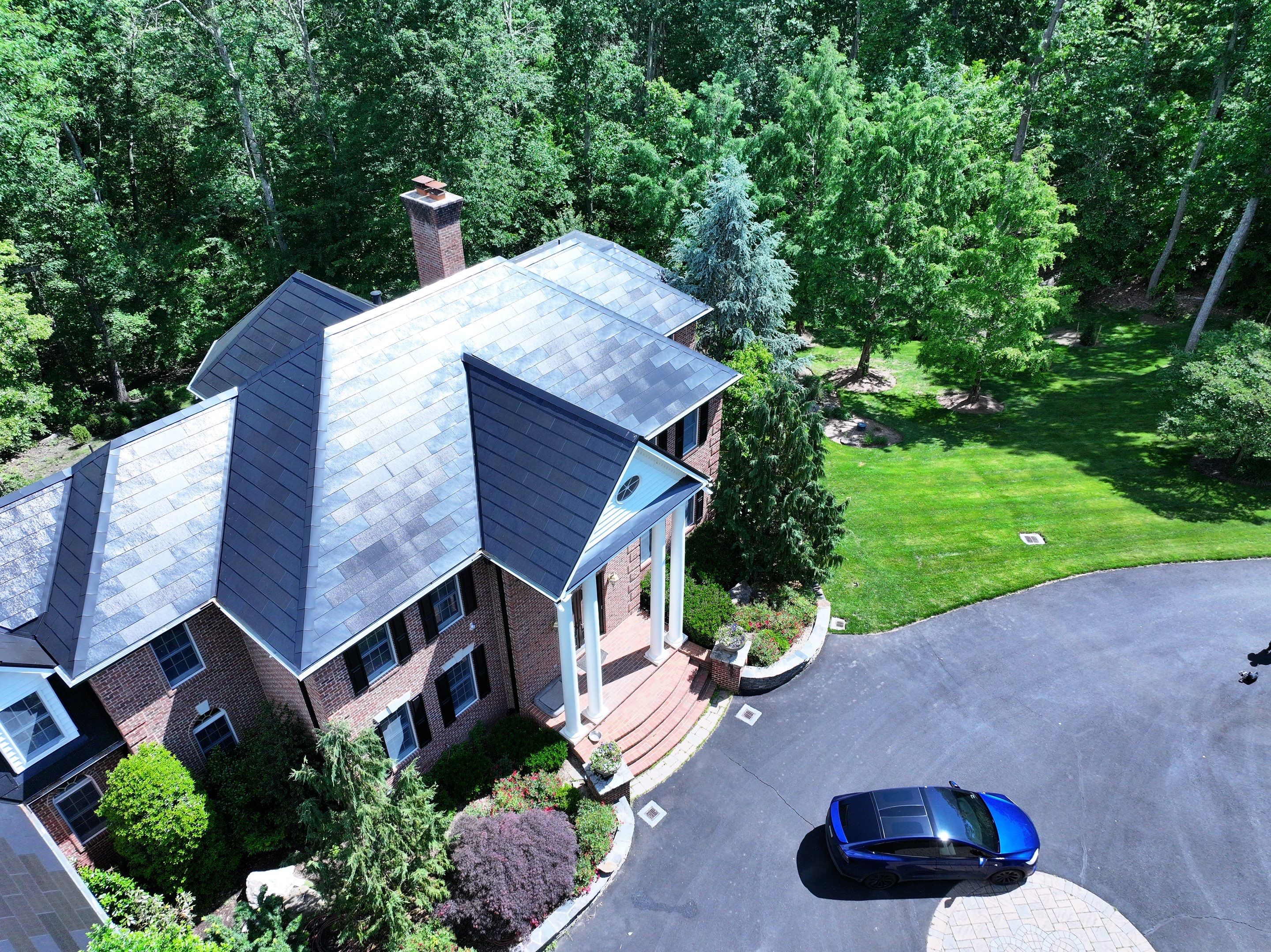 Tesla Solar Roof Replacement by American Home Contractors