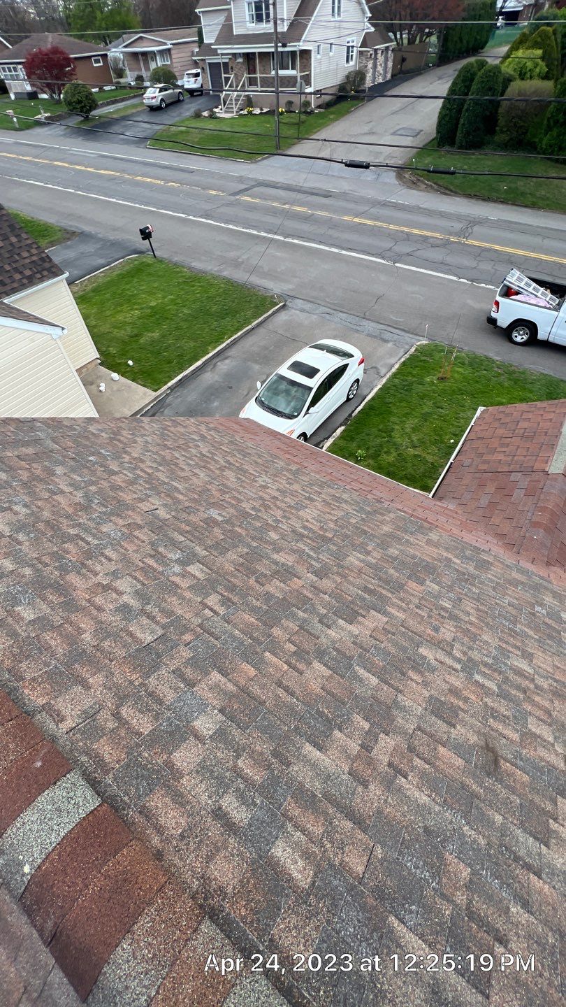 Estate Gray Shingles by Reimagine Roofing