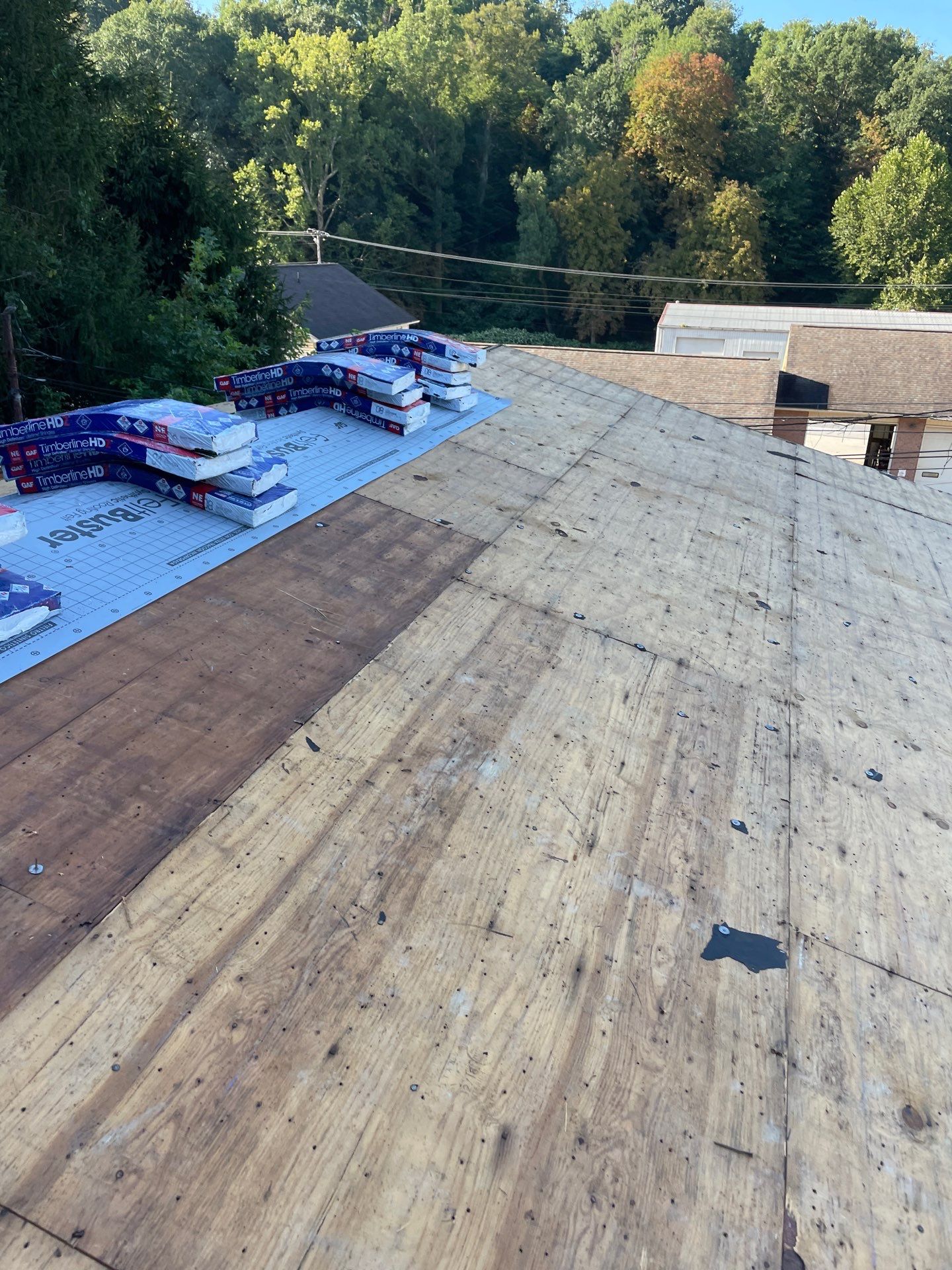 Residential Roofing Installation using GAF TImberline HDZ Hickory by Rainstoppers Roofing