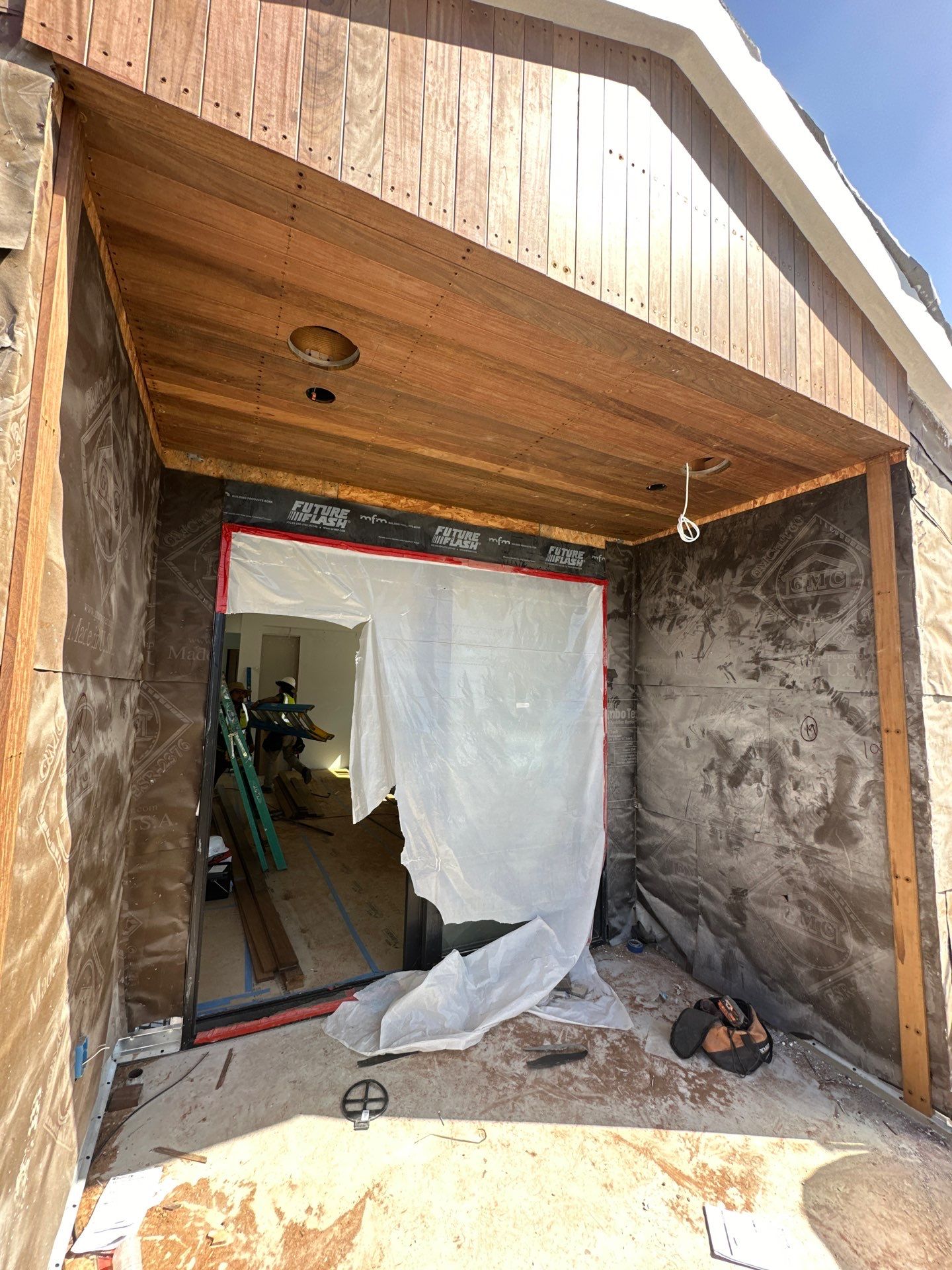 IPE vertical installation by New Era Siding Inc 