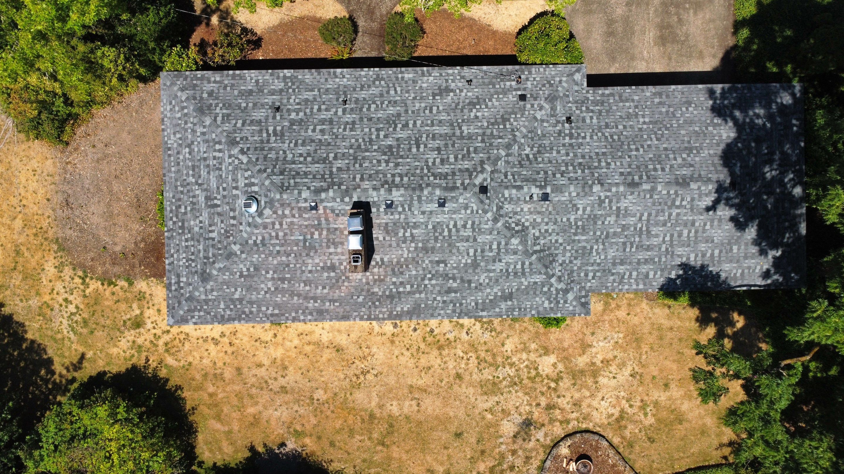 Residential Roofing Installation using IKO Dynasty (Color: Summit Grey) by Orezona Building & Roofing Company, Inc.
