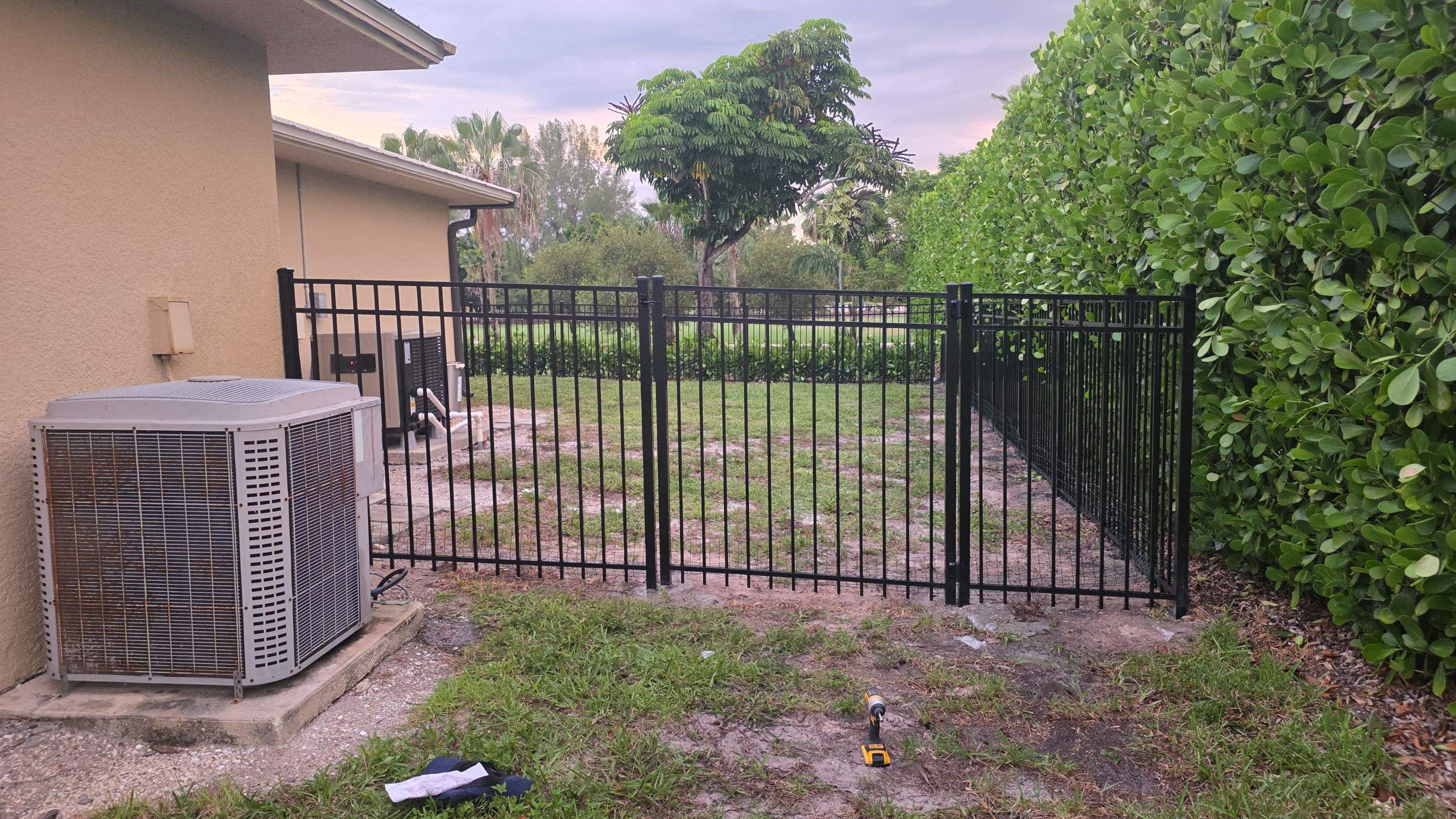 Black Aluminum Picket Fence Installation in Marco Island by True Fence LLC