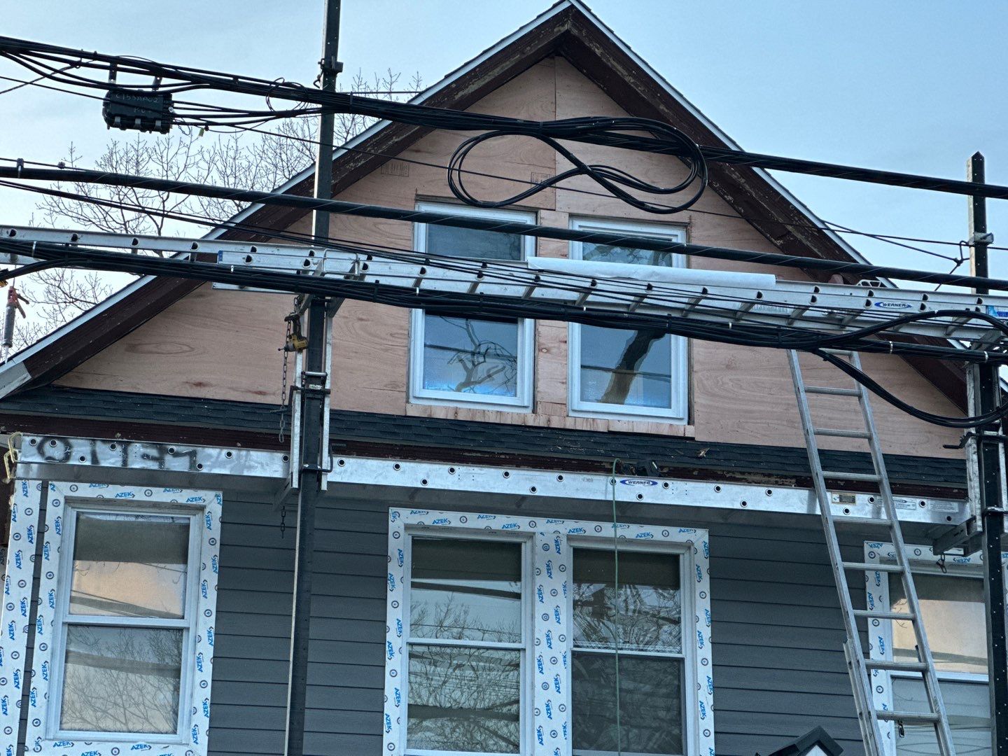 Siding Installation using Hardie Plank Aged Pewter by A Plus Exterior