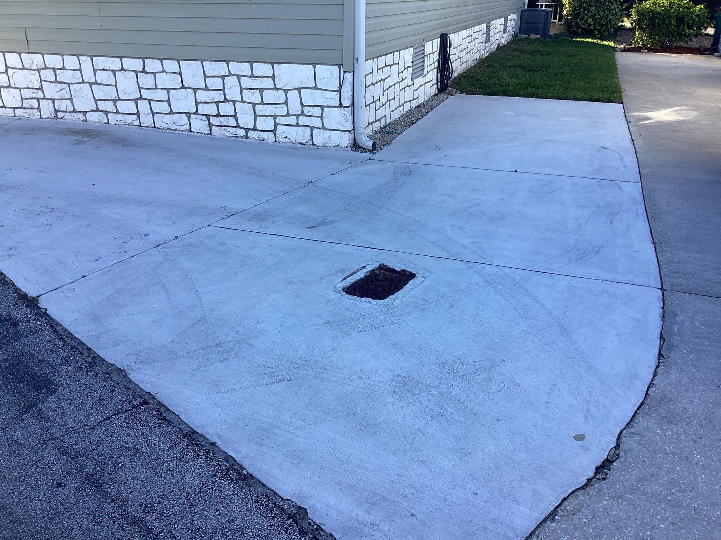 Driveway using Mt Everest by Amvet concrete coatings llc