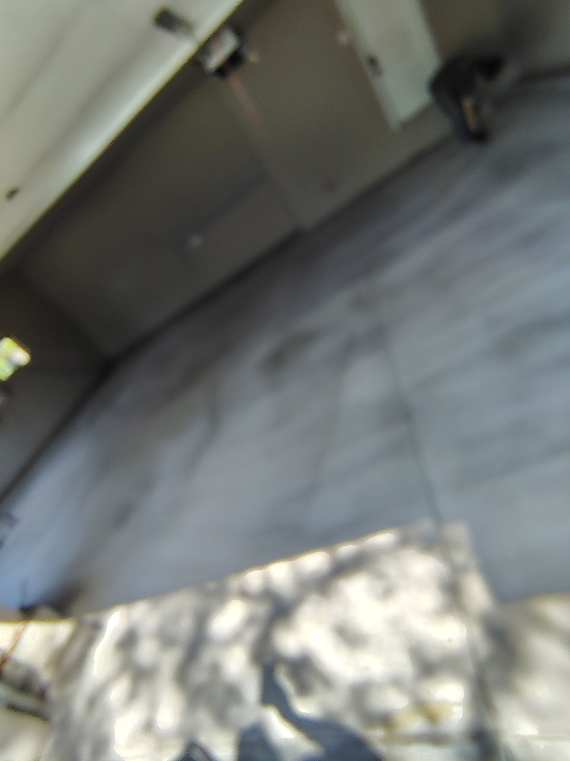 Sioux Falls Garage Concrete Repair and Epoxy Flake Floor Coating by Select Painting, Coatings & Garage Cabinets