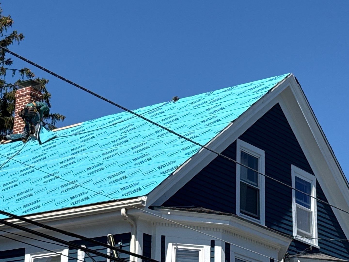 Half Roof Replacement for Solar Installation – Townhouse with New Plywood Decking by Sensible Home Solutions