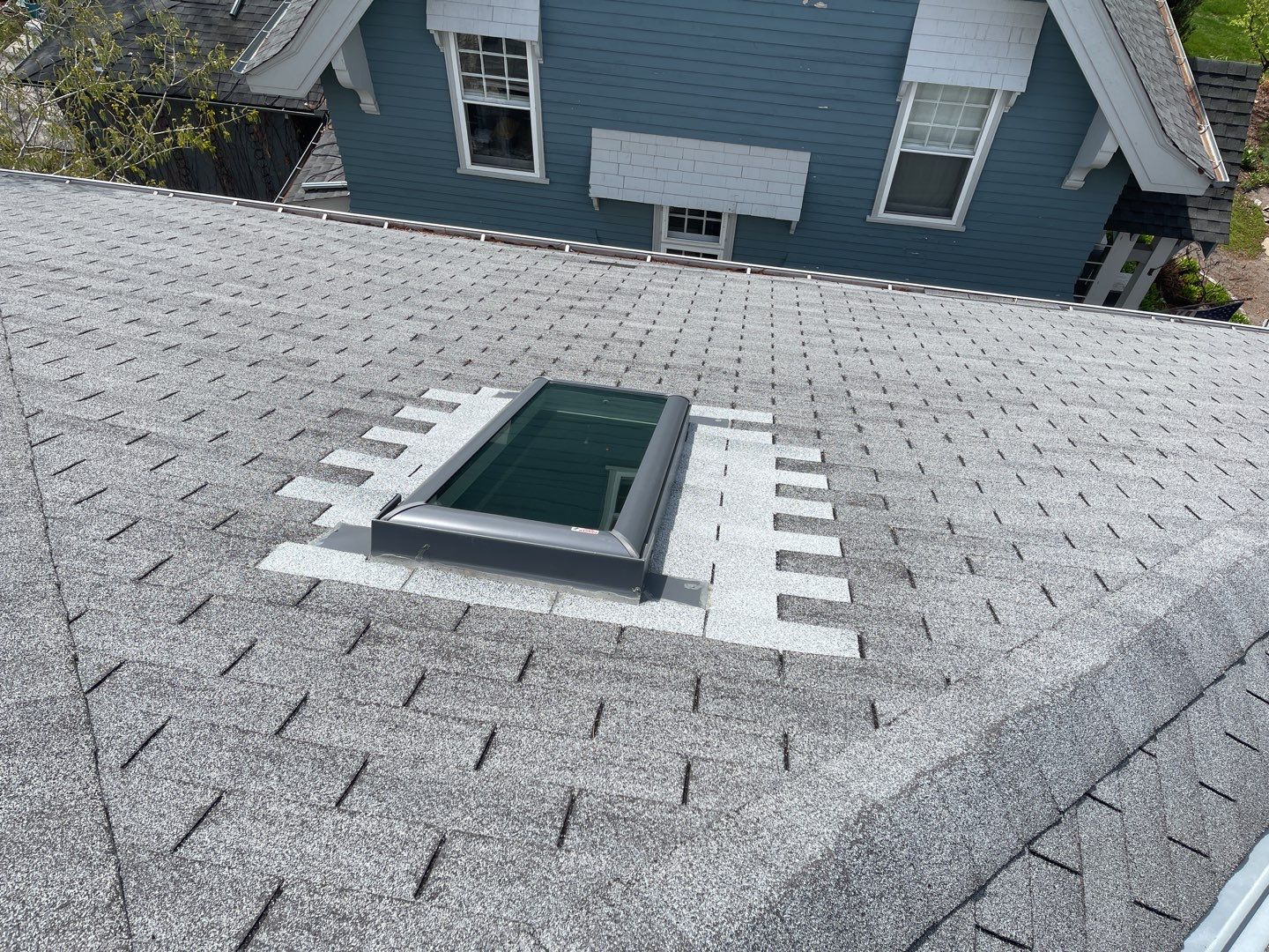 Minneapolis, MN – Roof and Skylight Replacement for New Homeowner by First Impressions Exteriors