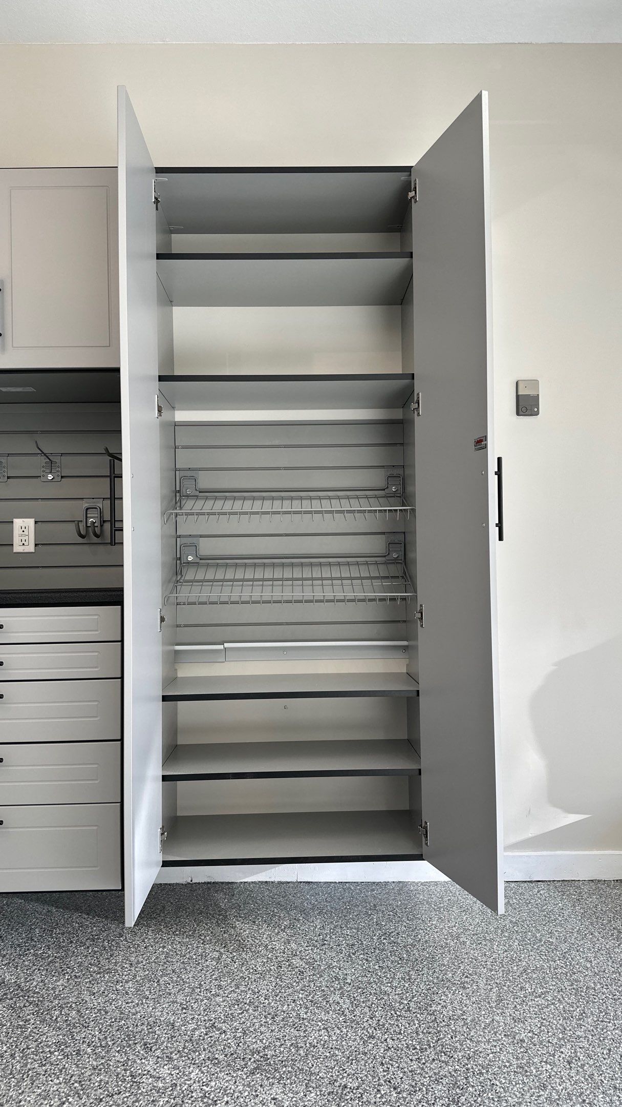 Macy T. transformed her garage with our beautiful cabinets by Banner Garage