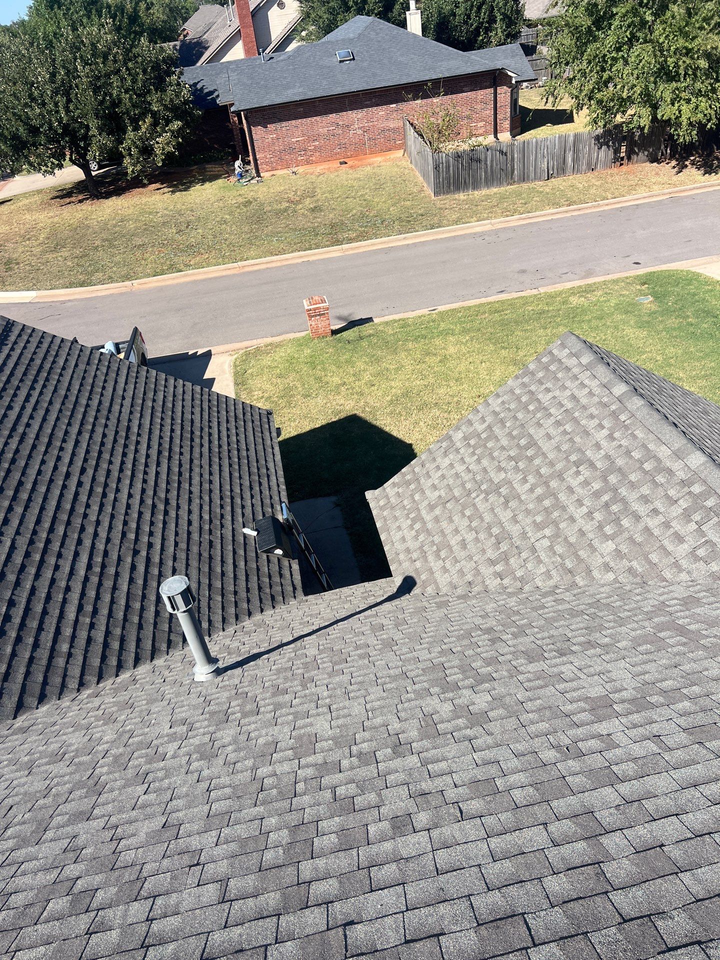 Roof Replacement and Gutter Installment in Edmond, OK by McCann's Roofing and Construction