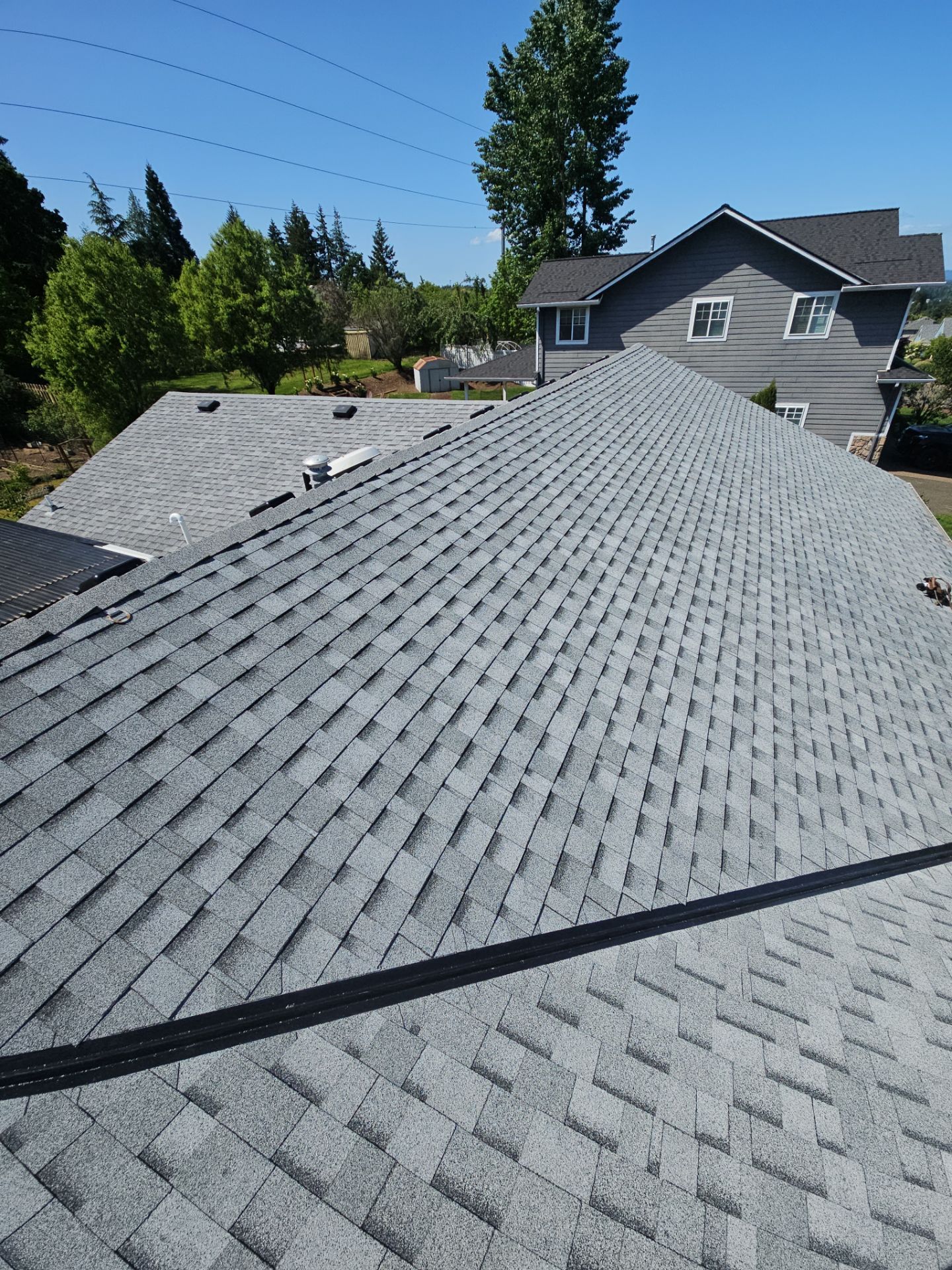 Residential Roofing Installation using IKO Cambridge (Color: Dual Grey) by Orezona Building & Roofing Company, Inc.