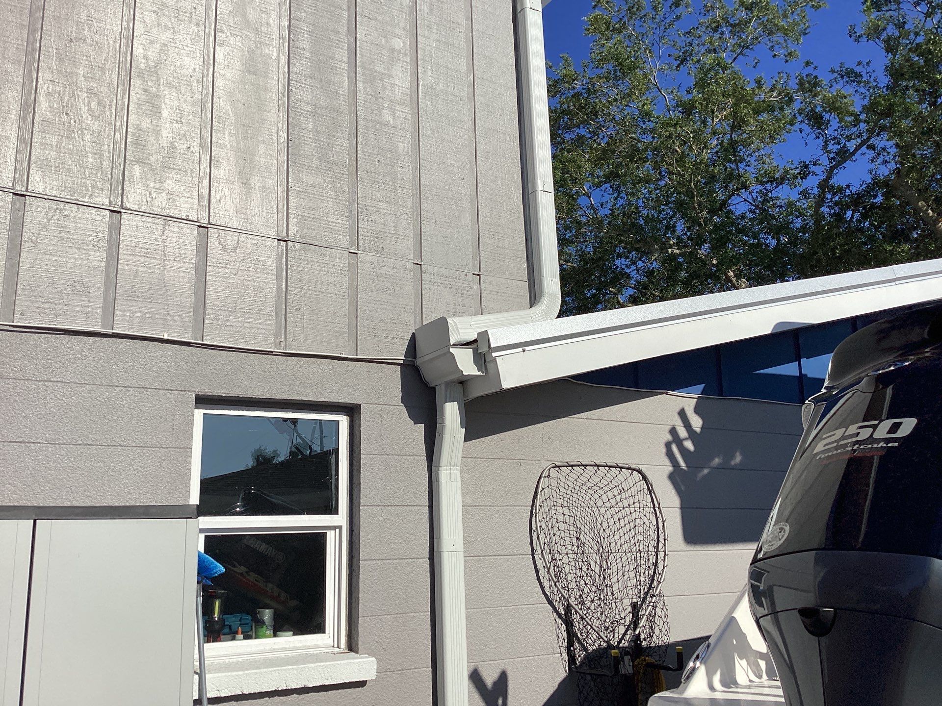 White K Style Seamless Gutters using 3X4 Elbow Downspout in Sarasota FL by Gutter Professors