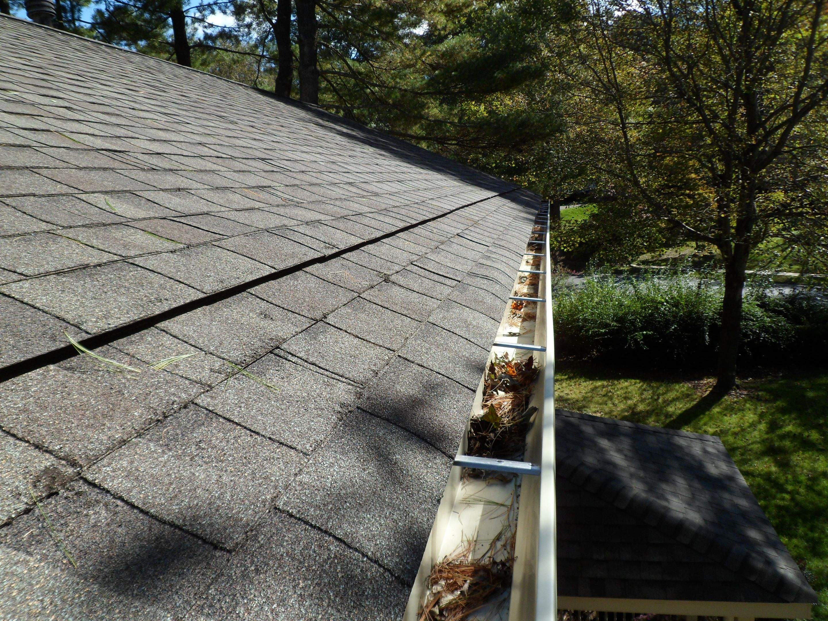 Residential Roofing Installation using Landmark Shingles Color Weatherwood by Alpha Design Services