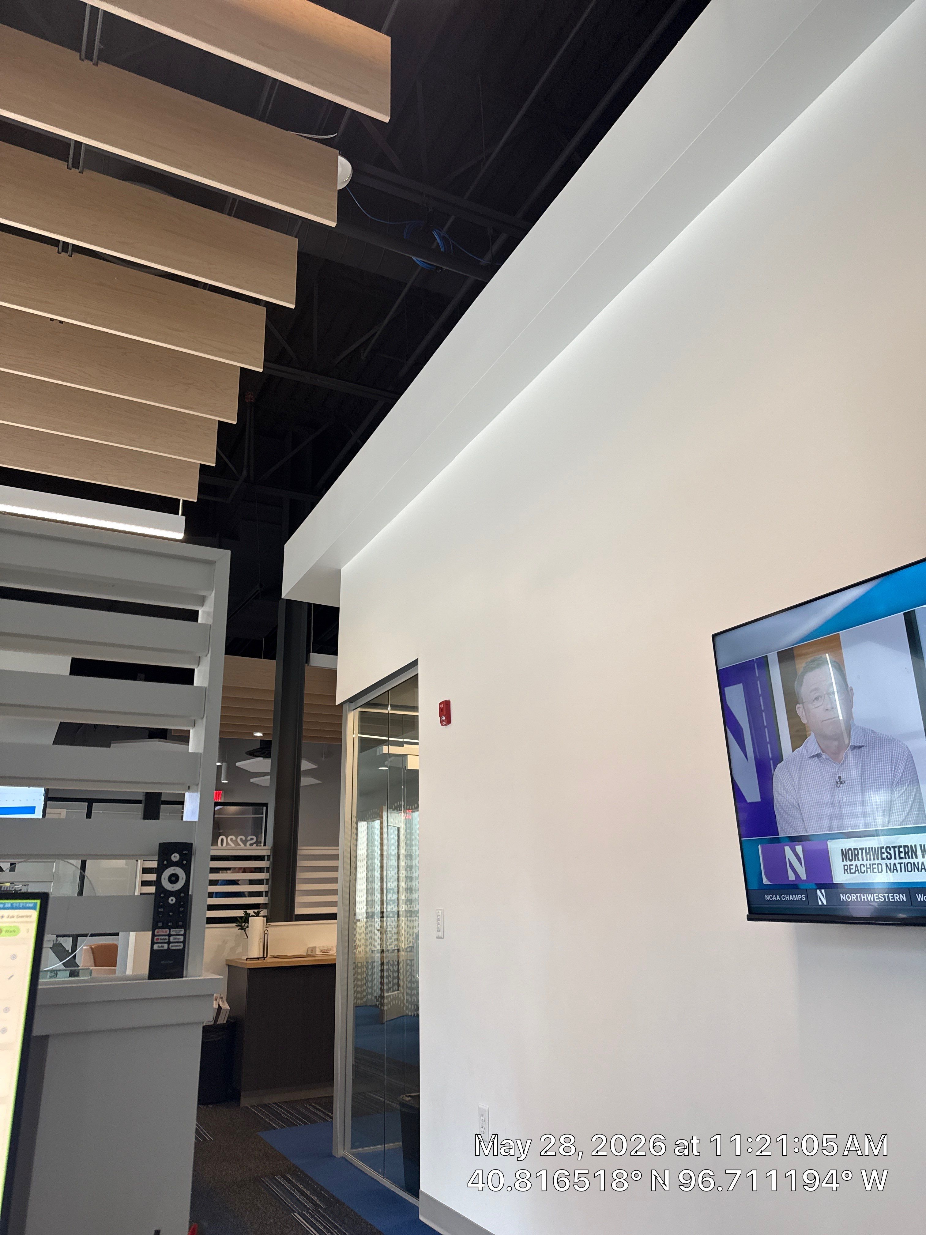 Lincoln Office Modernization Featuring Custom Baffles and AV Installation by CompanyCam Sales Demo