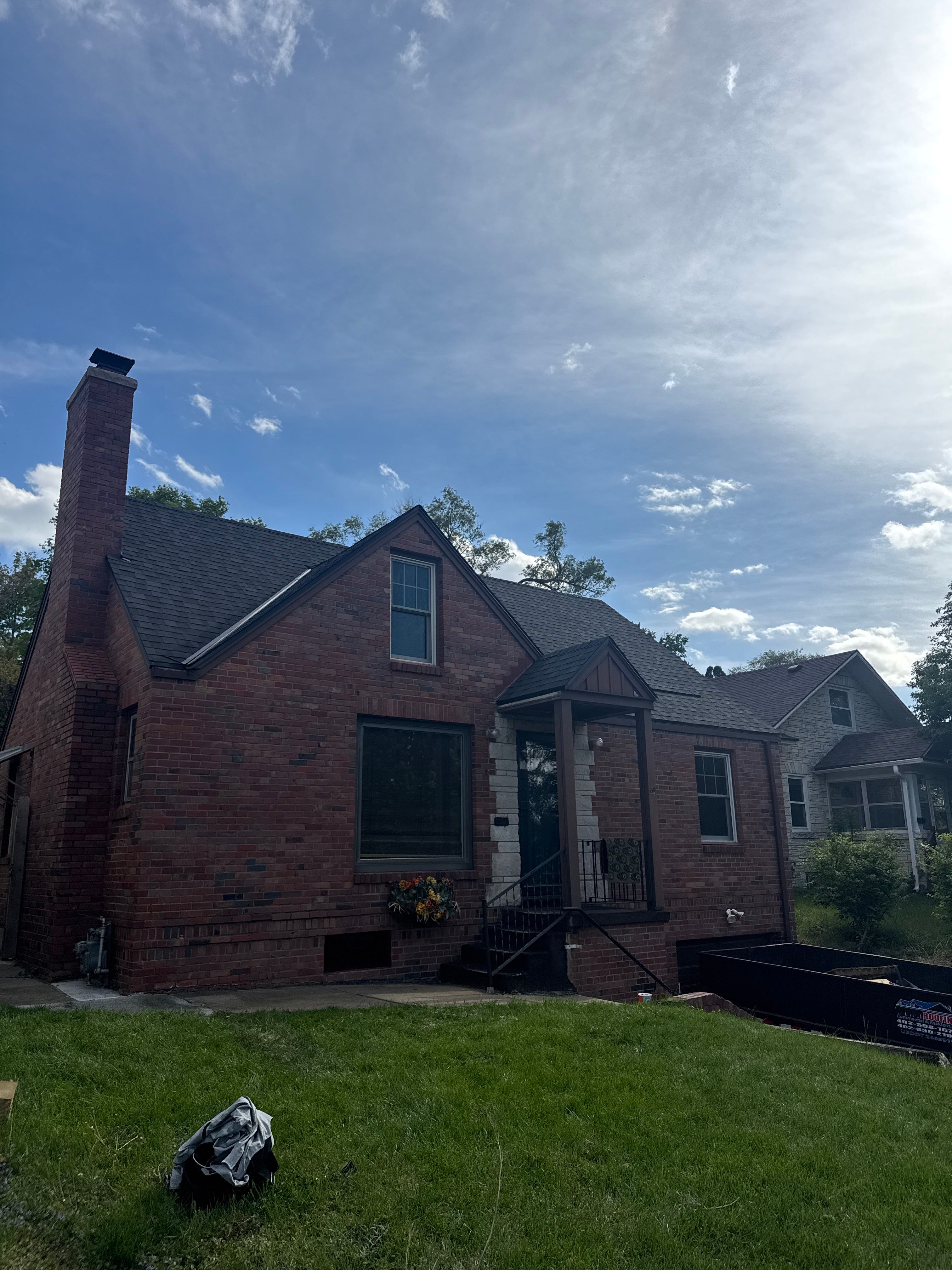 IKO Roof and Seamless Gutters by Lightning Exteriors