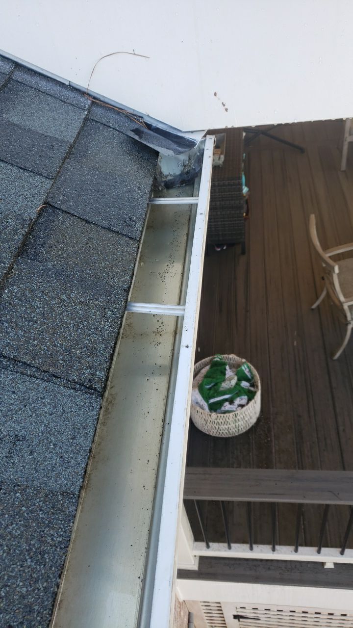 Gutter Cleaning using water by Power Wash Masters LLC