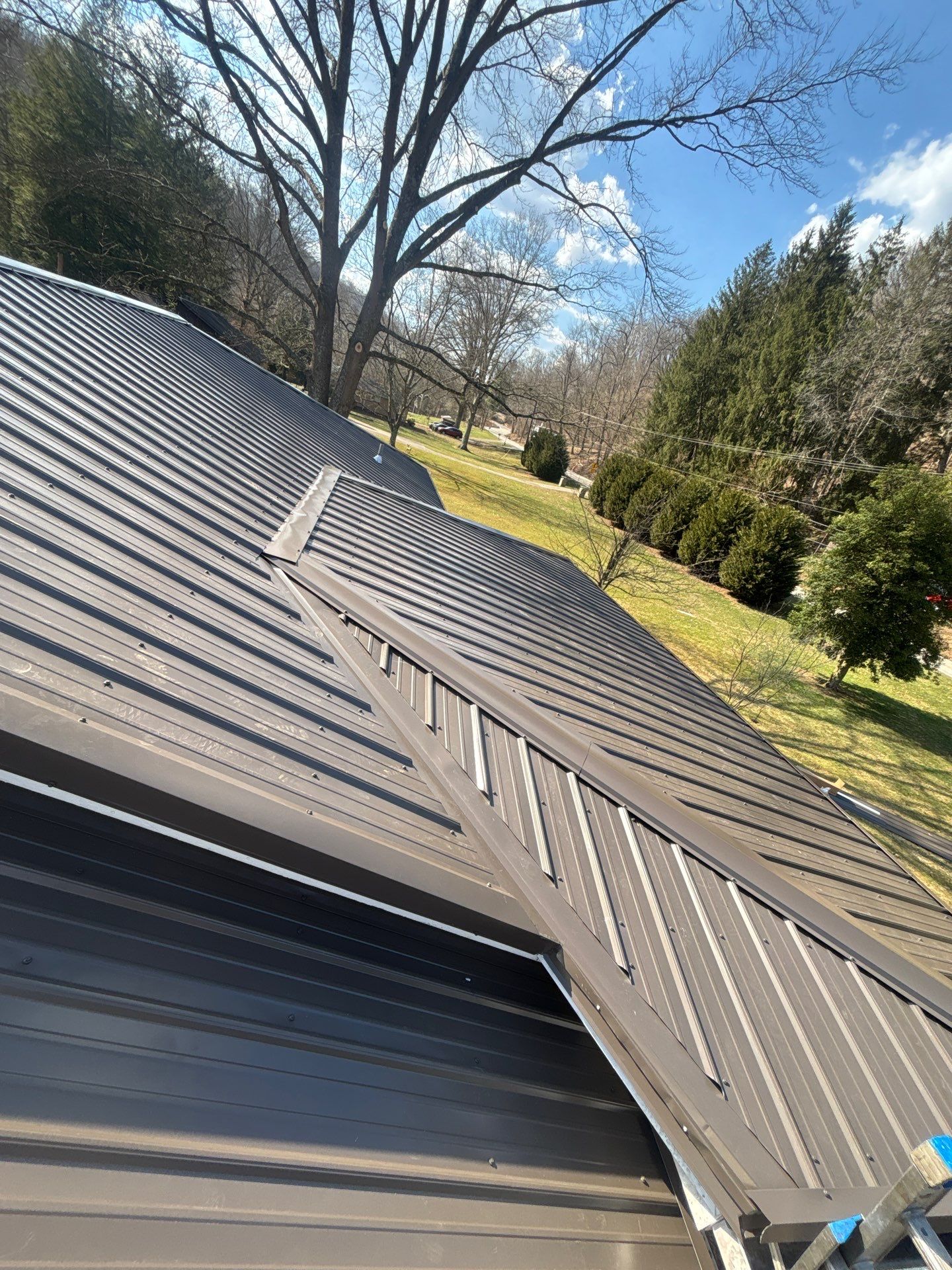 Residential Roofing Installation using Metal by Rainstoppers Roofing