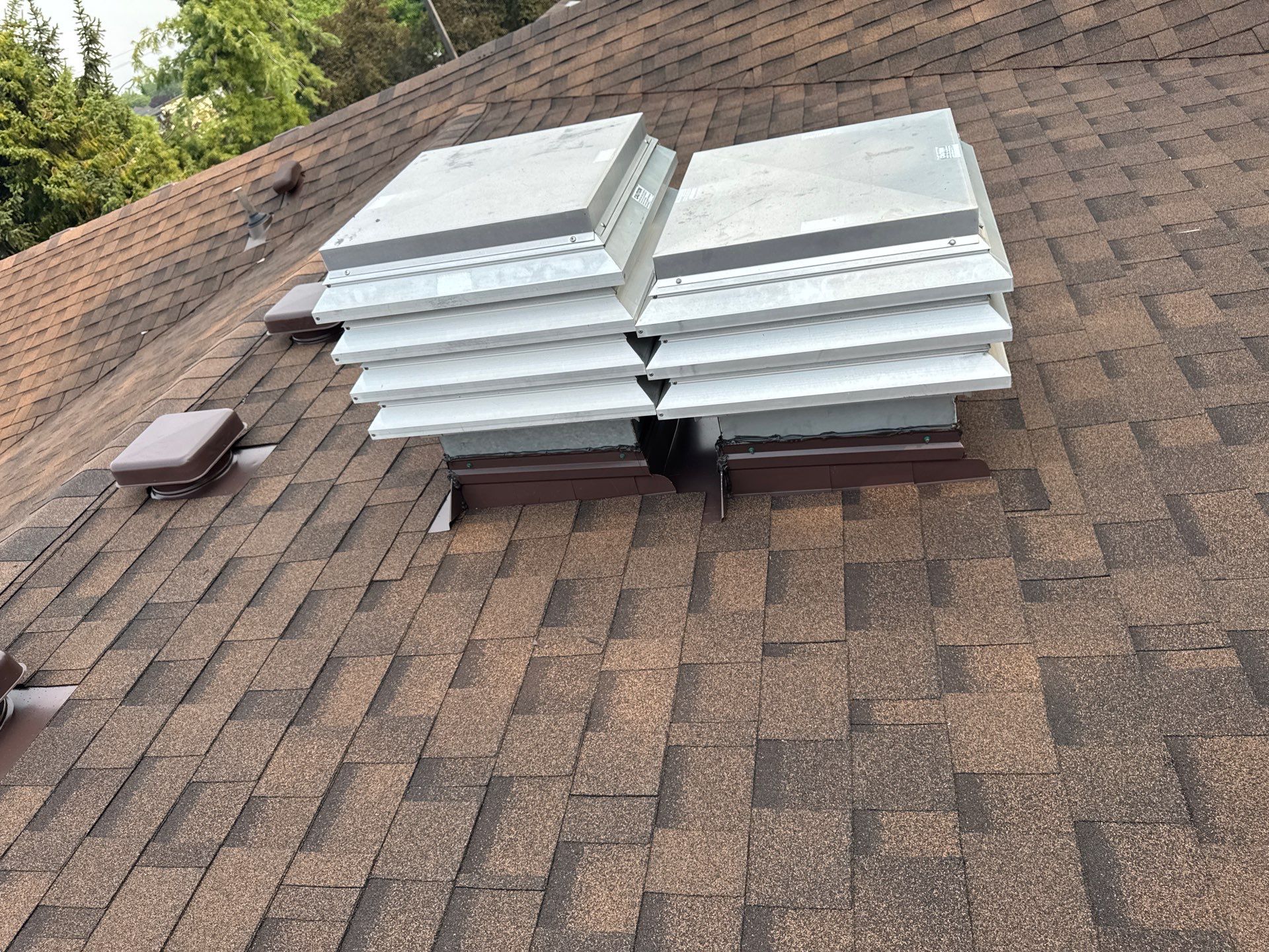 Boise Commercial Roof Replacement with Brown Architectural Shingles by Olive Roofing