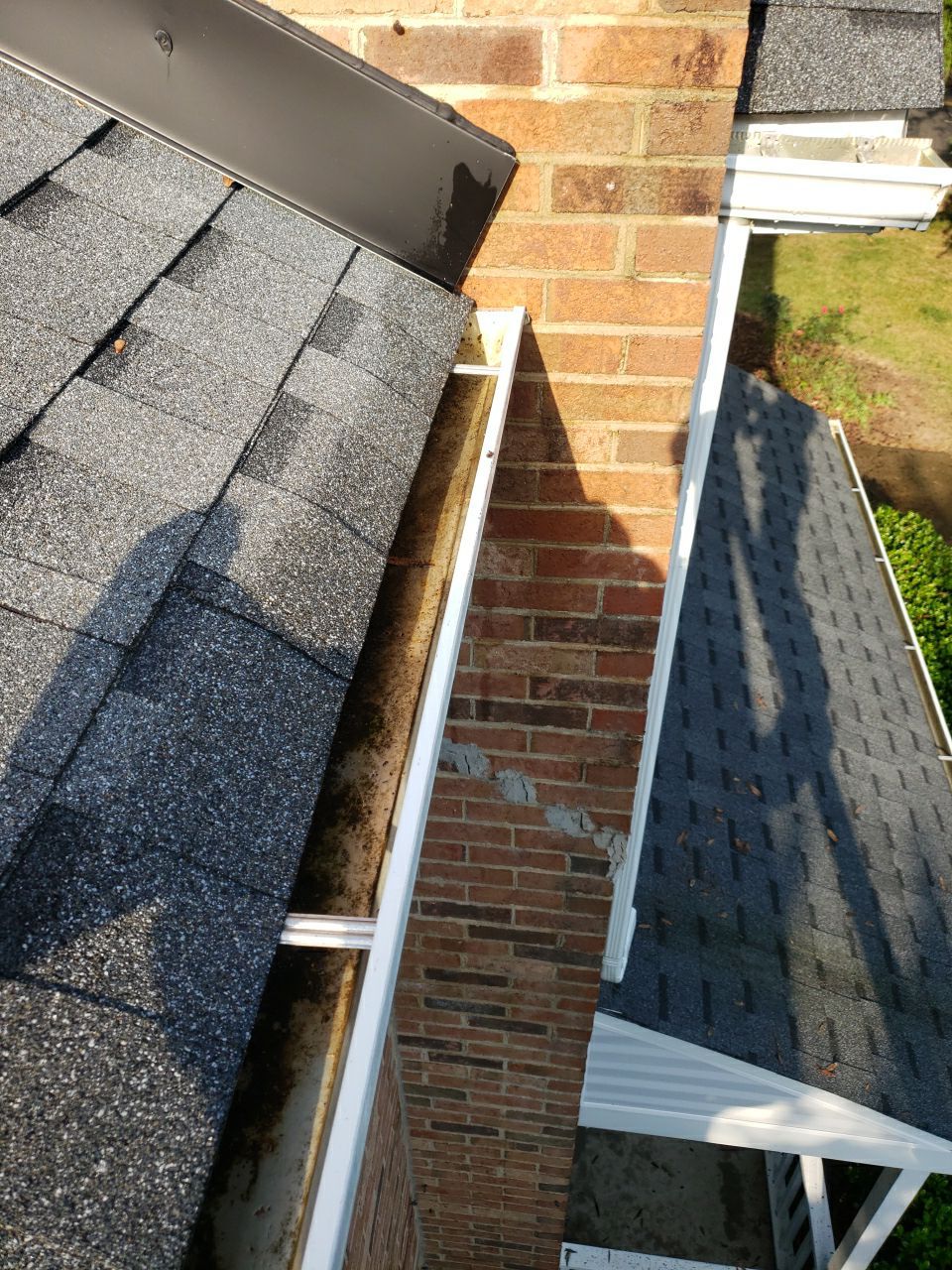 Gutter Cleaning using water by Power Wash Masters LLC