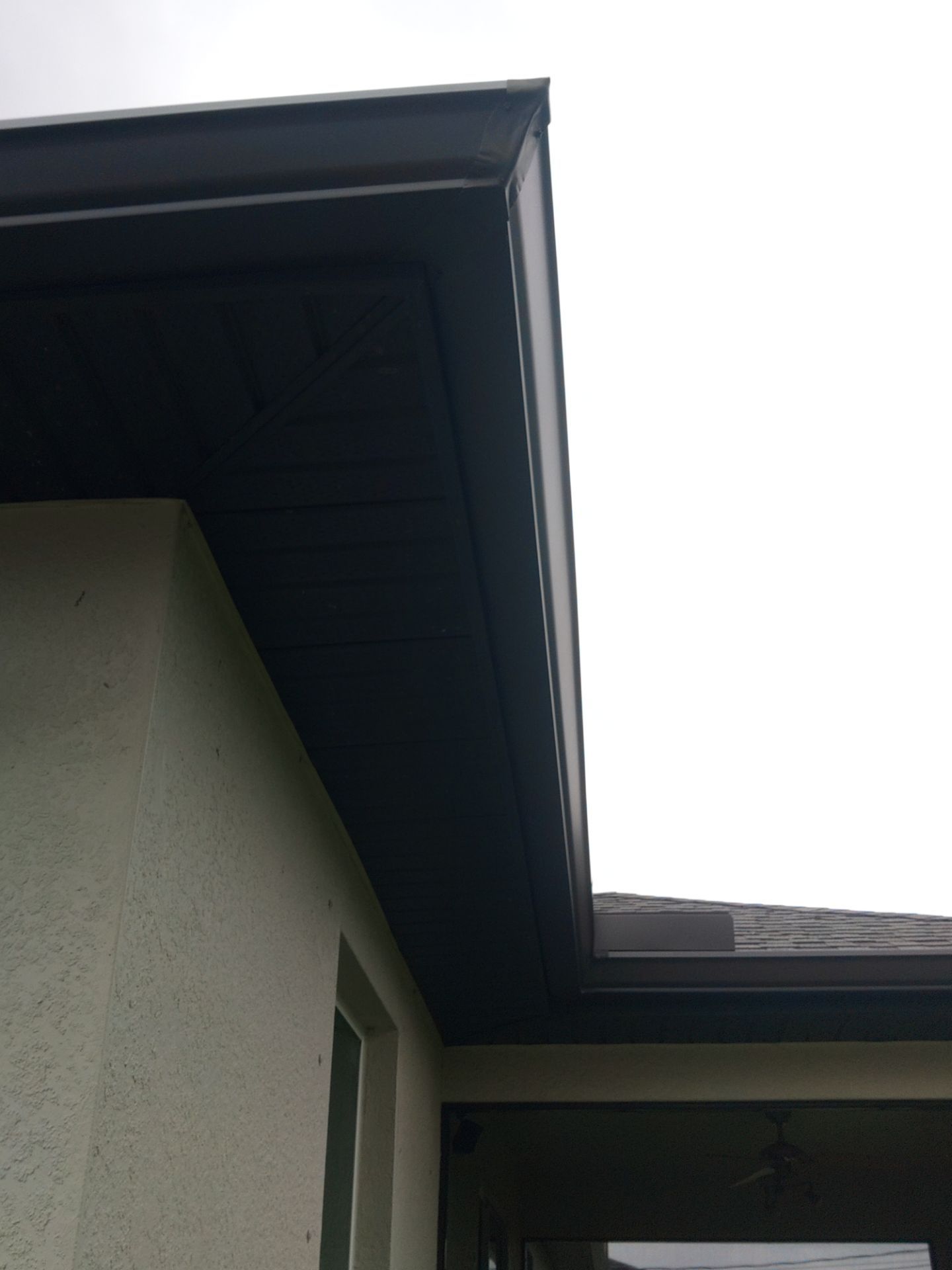 Black Seamless Gutters using black seamless gutters in Cape Coral FL by Gutter Professors