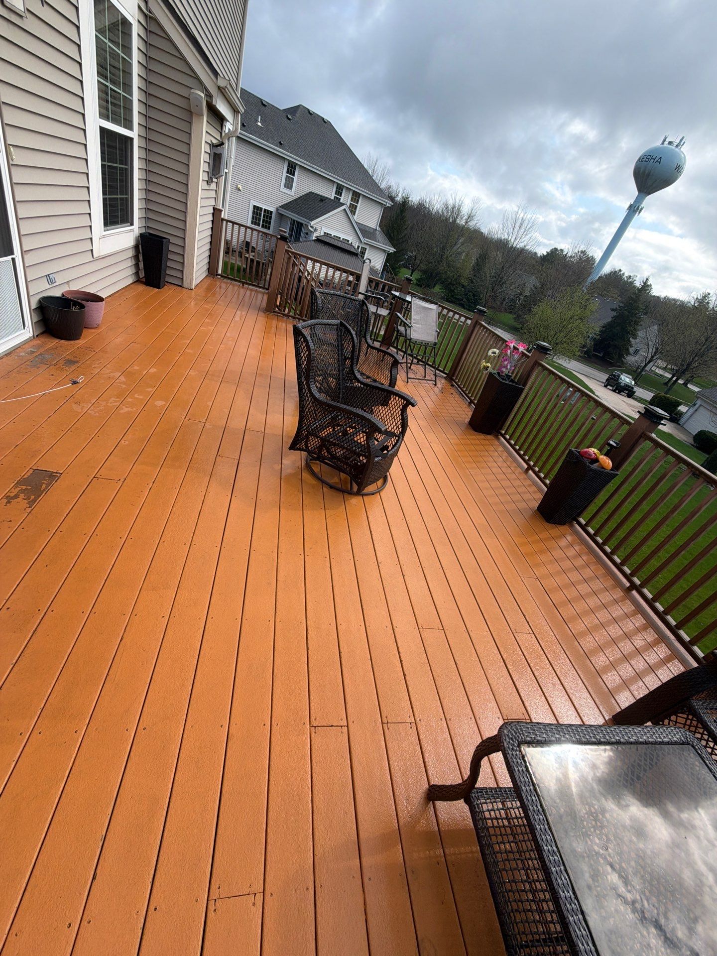Elevated Wood Deck Refinishing and Railing Restoration in Waukesha by OCS Contracting Services