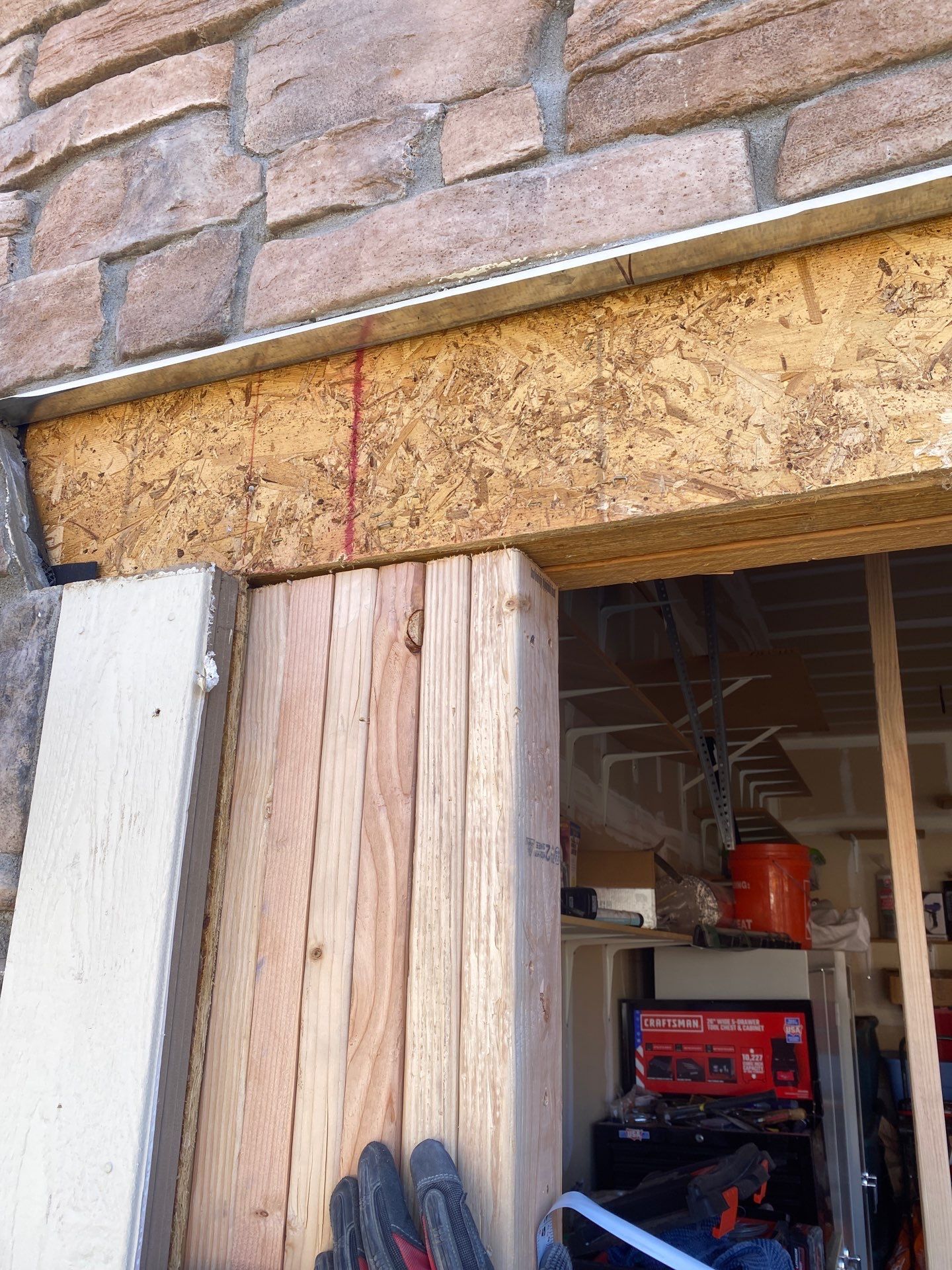 Garage door conversion by David & Goliath Contracting 