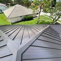 24ga 1.5" Mechanical Seam Dark Bronze by Total Roofing System The Metal Roof Experts