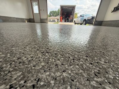 Feather Grey Garage Floor Coating and Concrete Restoration in Mitchell