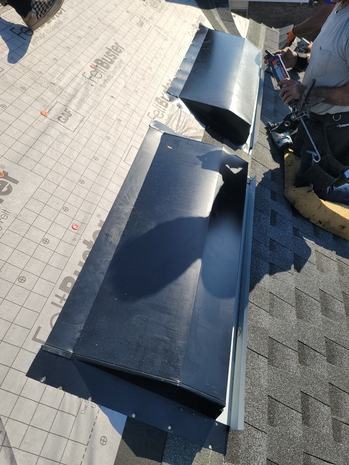 Residential Roofing Installation using Roof Replacement by American Roofing & Construction LLC