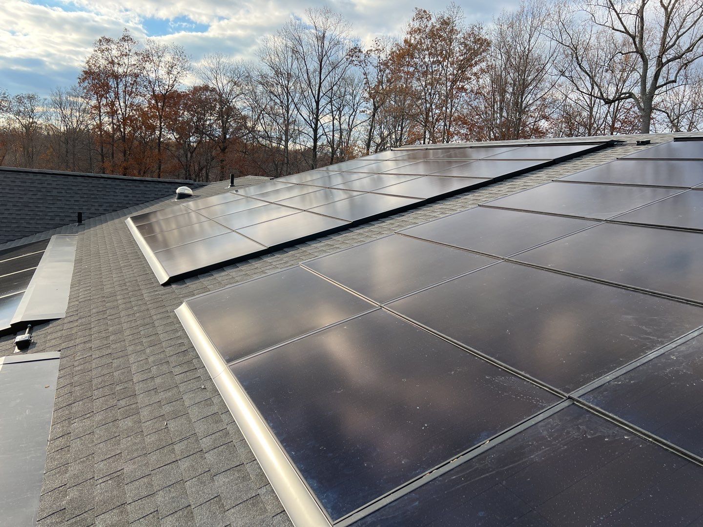 Solar Roof using GAF Decotech integrated panels by American Home Contractors
