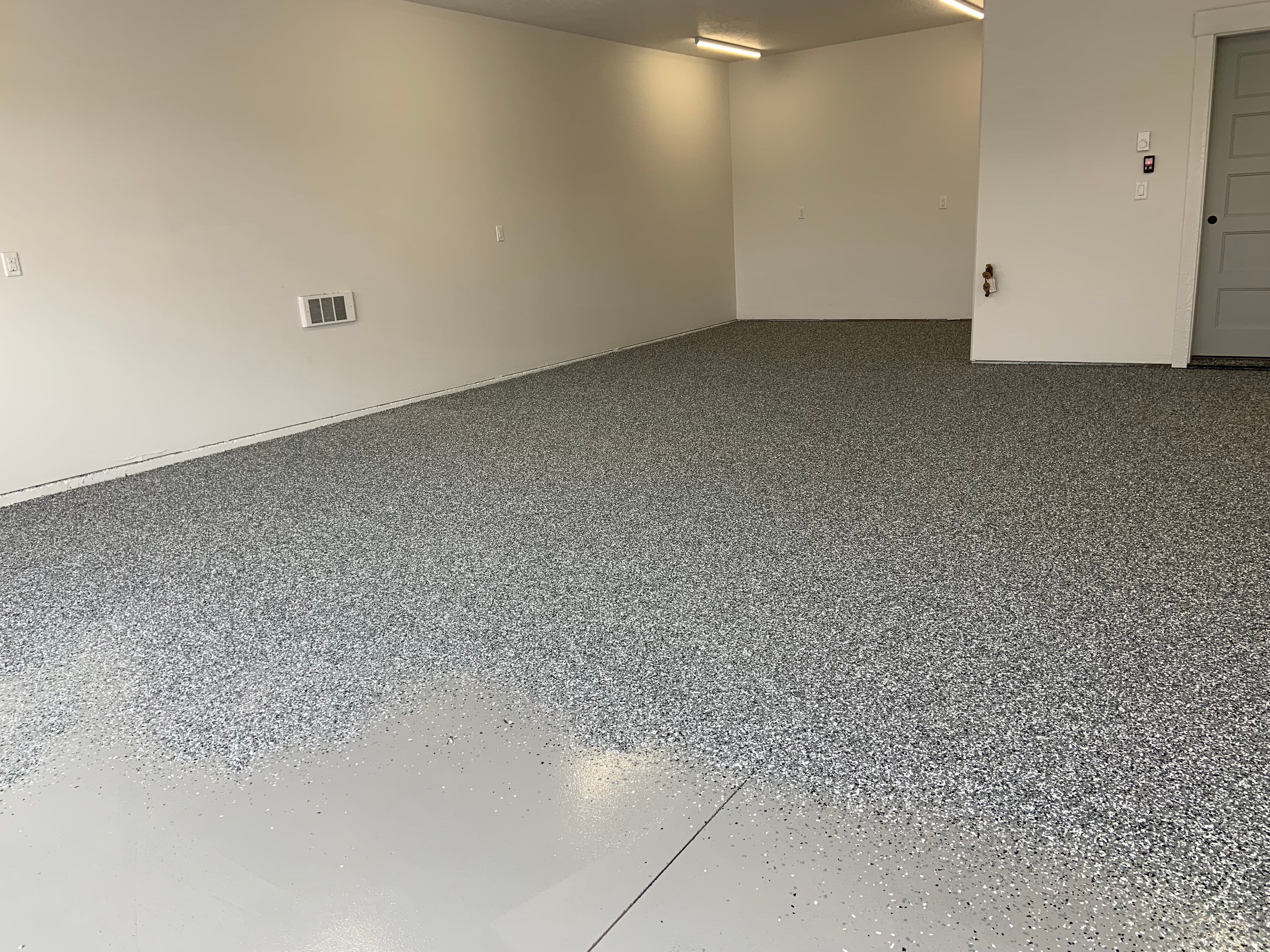 Garage Transformation using Smoke by Croc Coatings, LLC