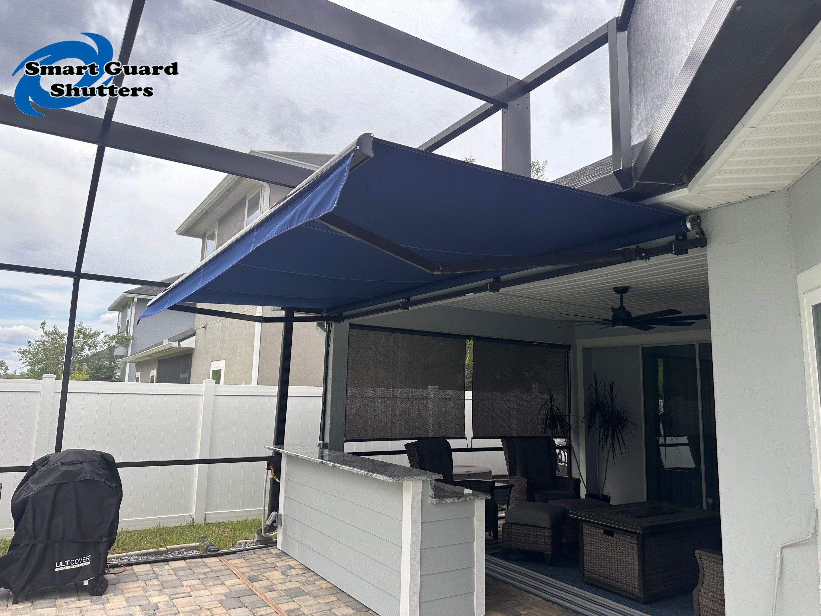 Retractable Awning in Marine Blue  by Smart Guard Shutters