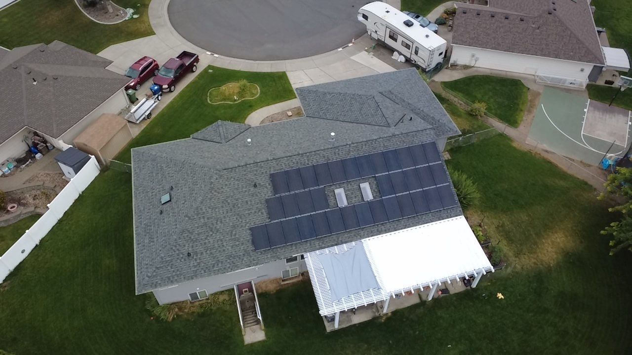 Spokane Residential Roof Replacement With Solar Panel and Skylight Integration N Portsmouth Ct Spokane, WA 99208  The Denali System - Certainteed Landmark® Shingle - Granite Gray by Alpine Roofing