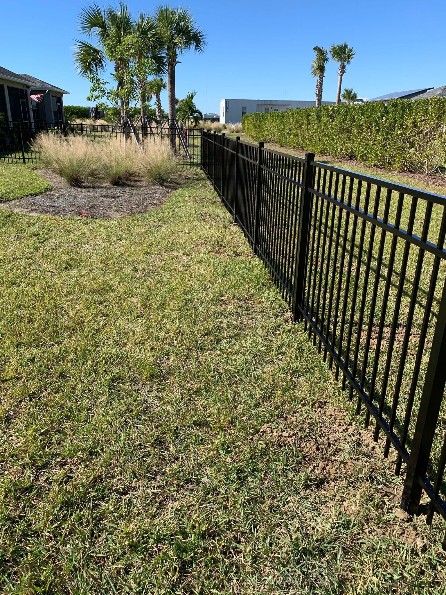 Aluminum Fence Installation using 4ft 3 Rail Black Aluminum Fence by Asap fence and gates, LLC