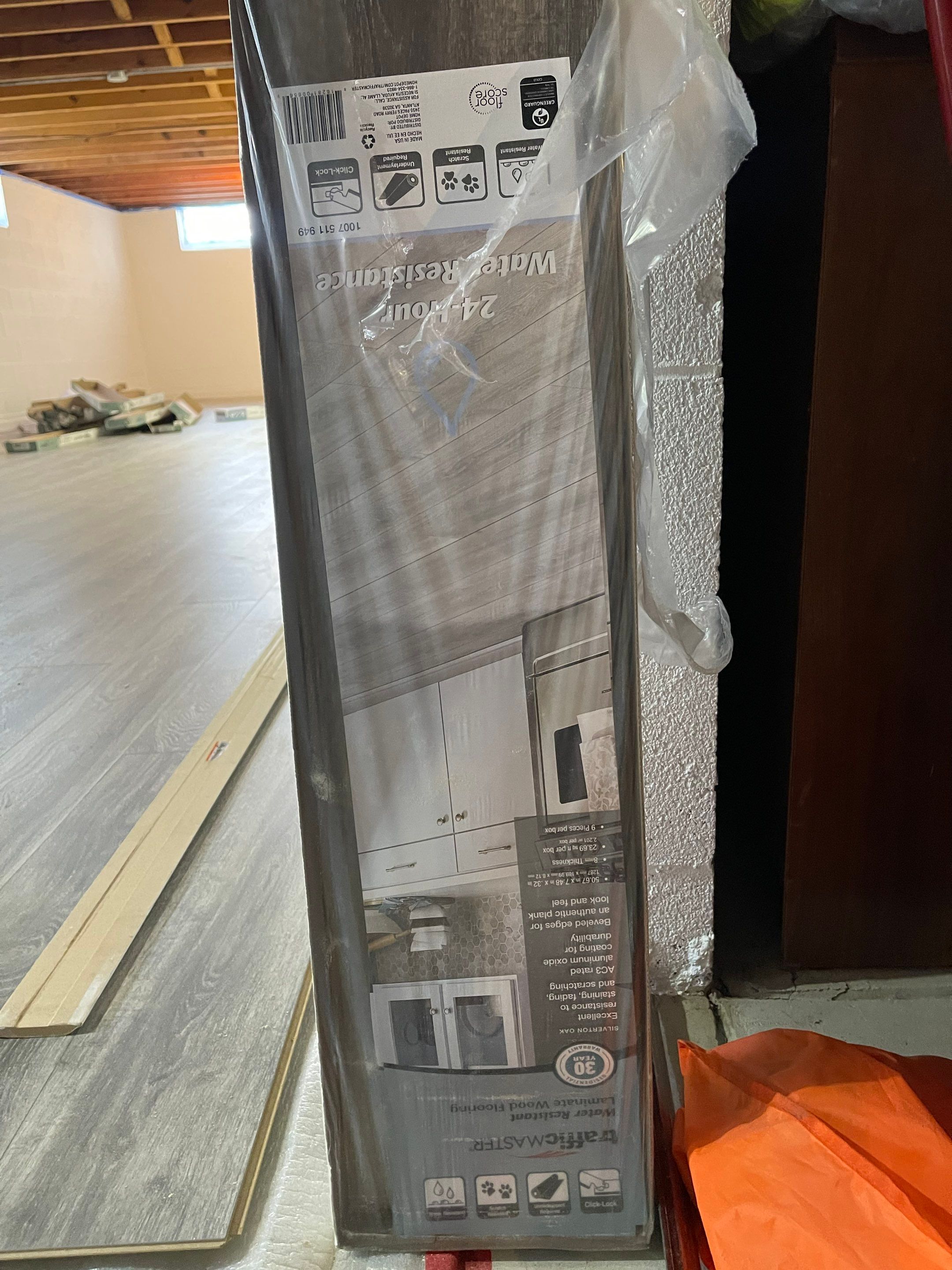 Flooring Installation and Basement Wall Painting using DryLok Extreme by Callaway Contracting LLC