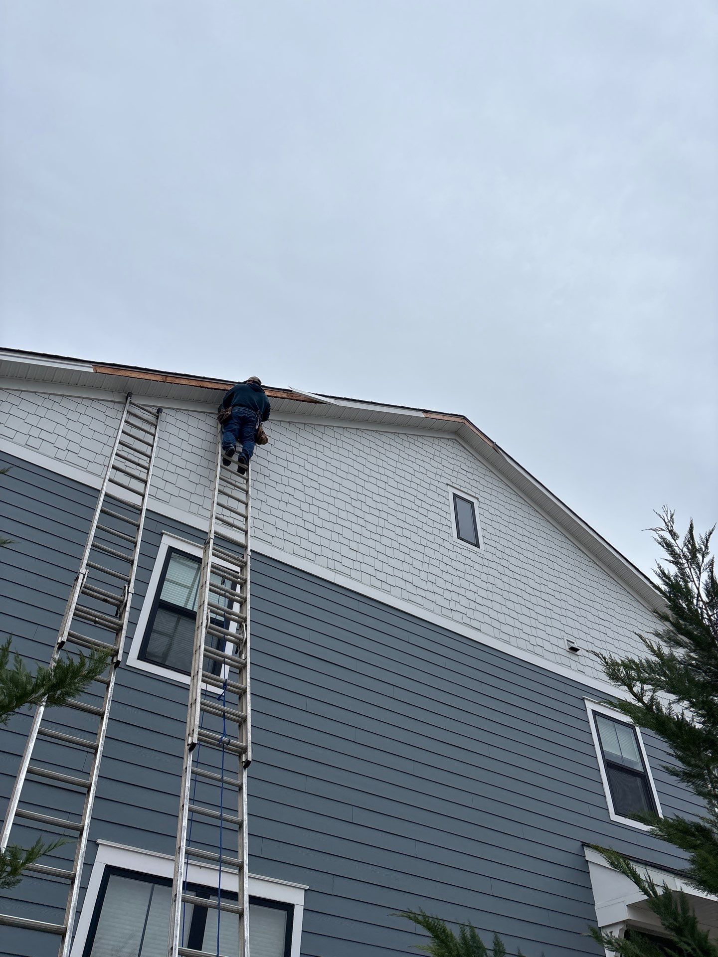 Siding and Trim Repair by Winchester Roofing