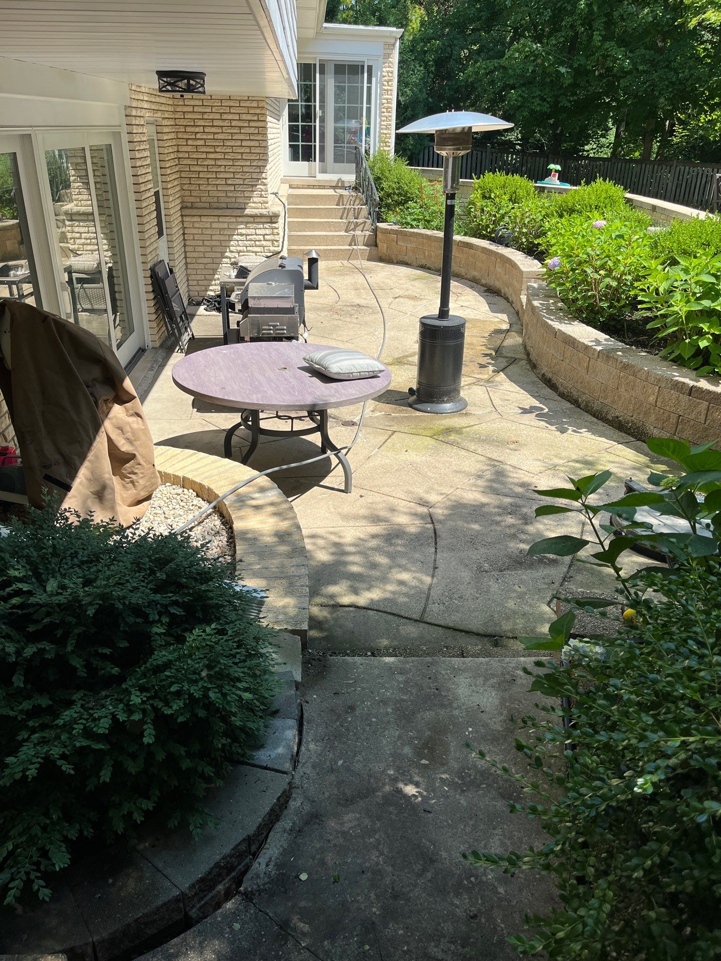 concrete power washing using Algaecide, soft wash soap by Northern Power Washing LLC.