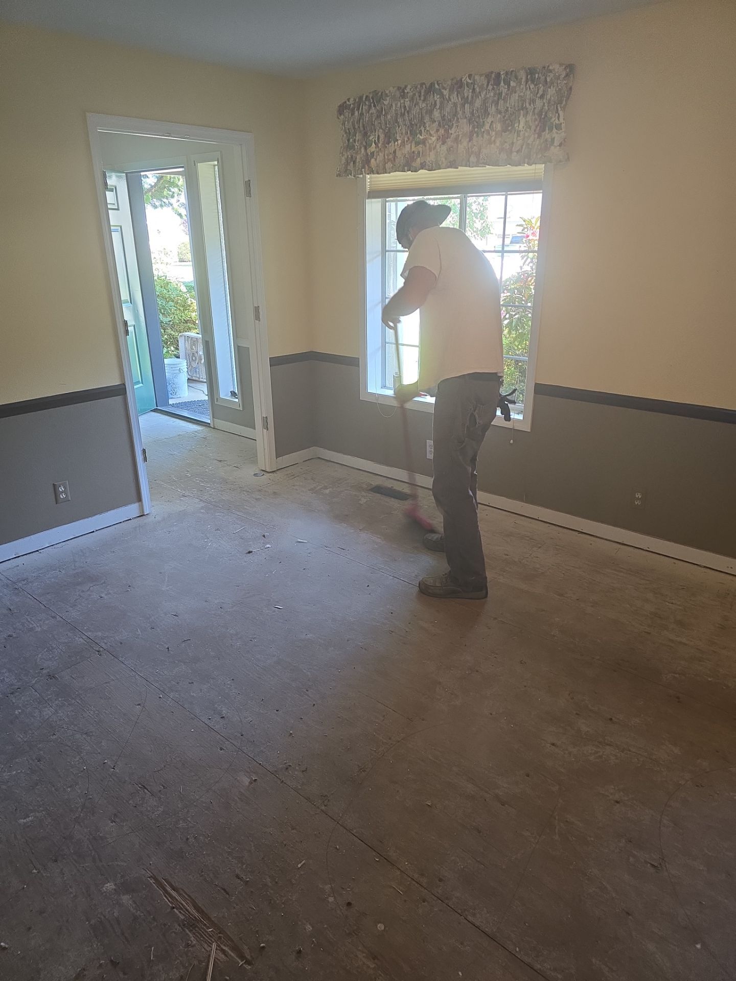 Engineered Wood Flooring Installation and Staircase Upgrade in Brookings by KMD Surfaces INC.