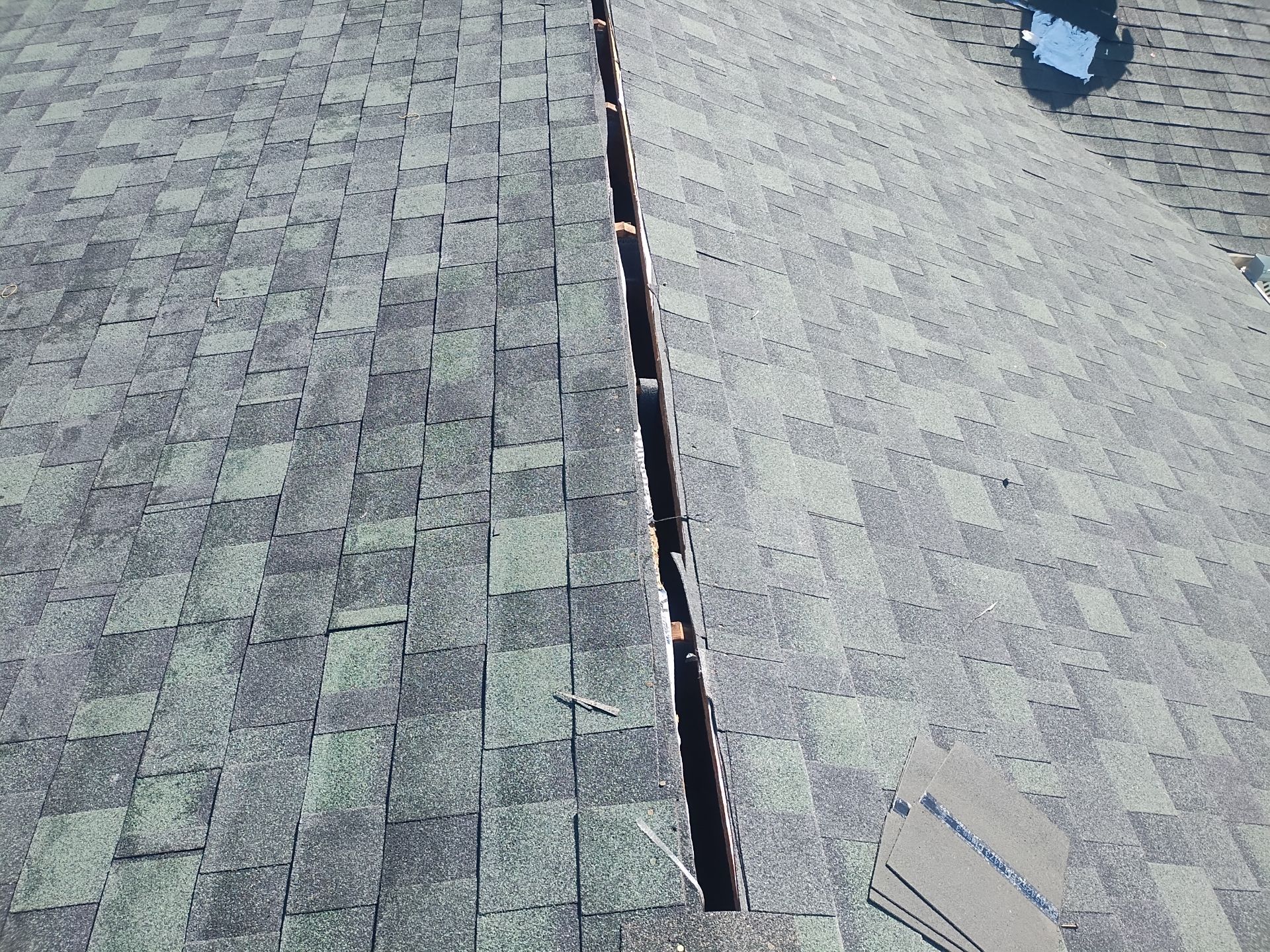 Residential Roofing Installation using Performance Shingles by Mr. Roofer
