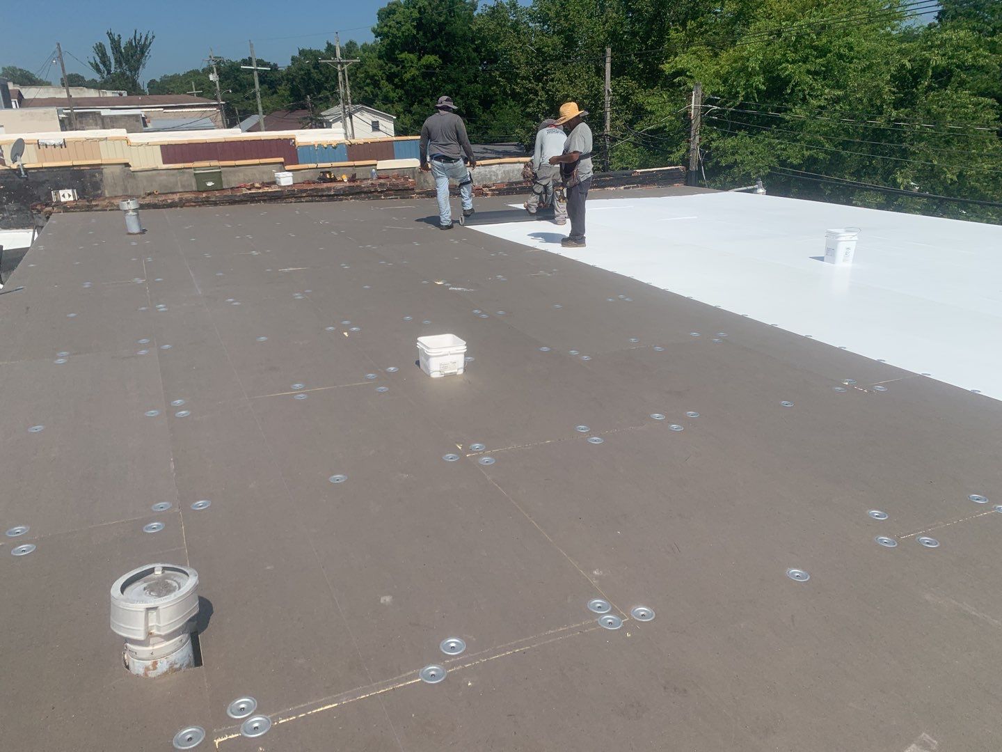 Commercial Roofing Installation in DeQueen, AR, using 50 mil PVC by Hostetler Roofing