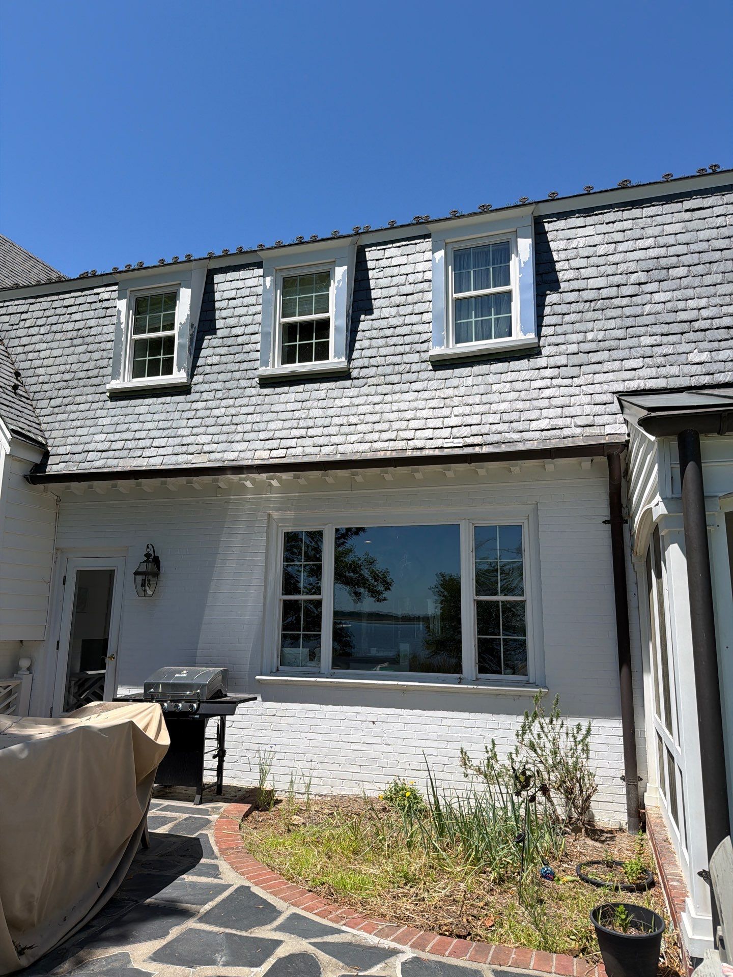 Historical Slate Roof Repair and Chimney Flashing Restoration in West Point by Cade Construction