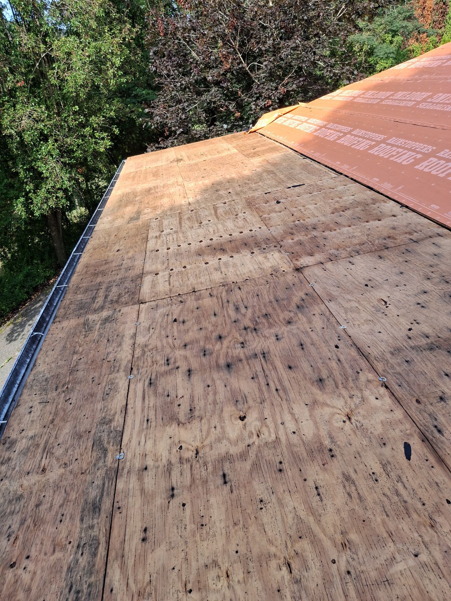 Residential Roofing Installation using GAF Timberline HDZ Charcoal by Rainstoppers Roofing
