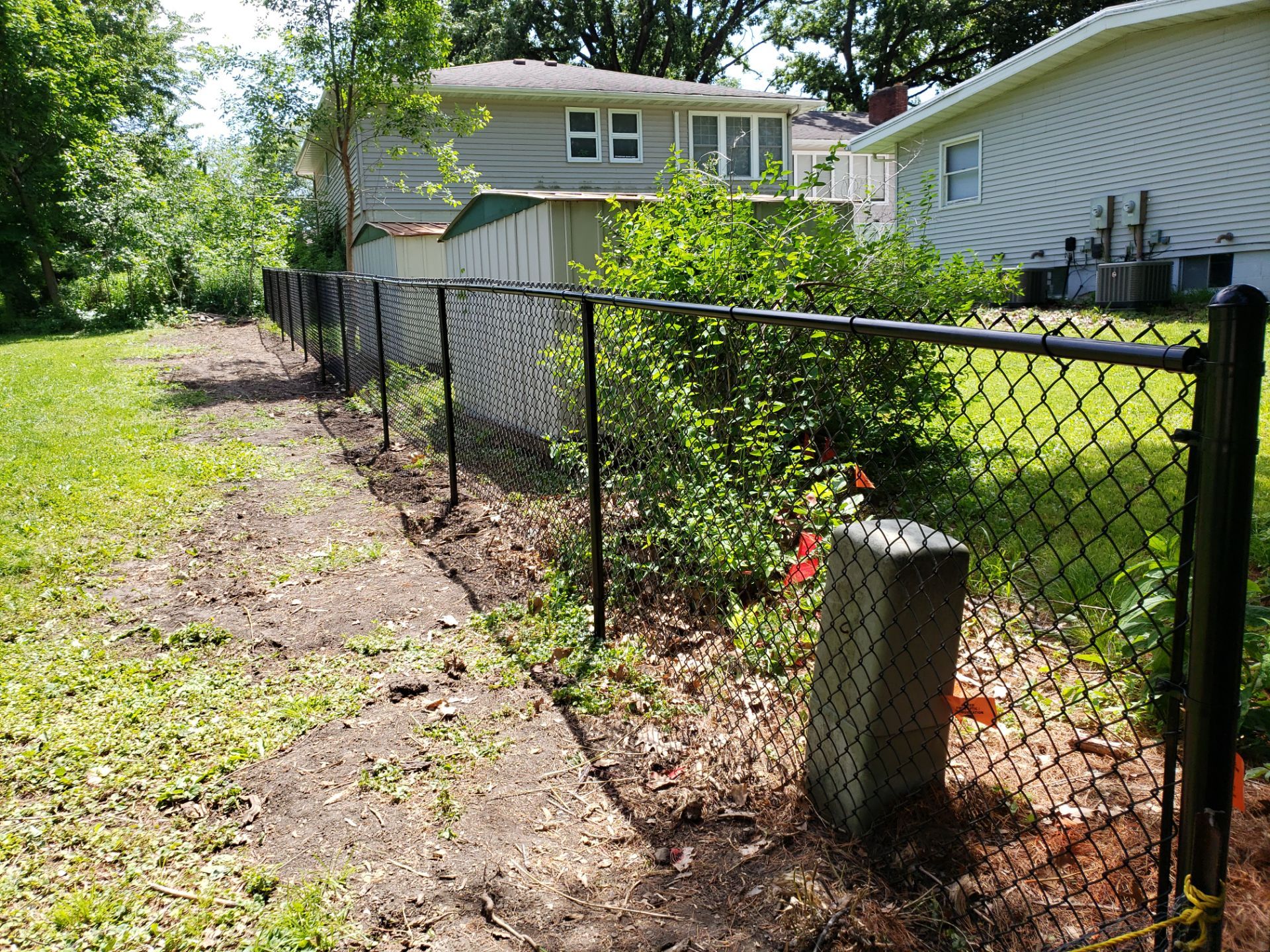 Black Chain Link Fence Installation in Cedar Falls by Perfect Picket Fence and Stain