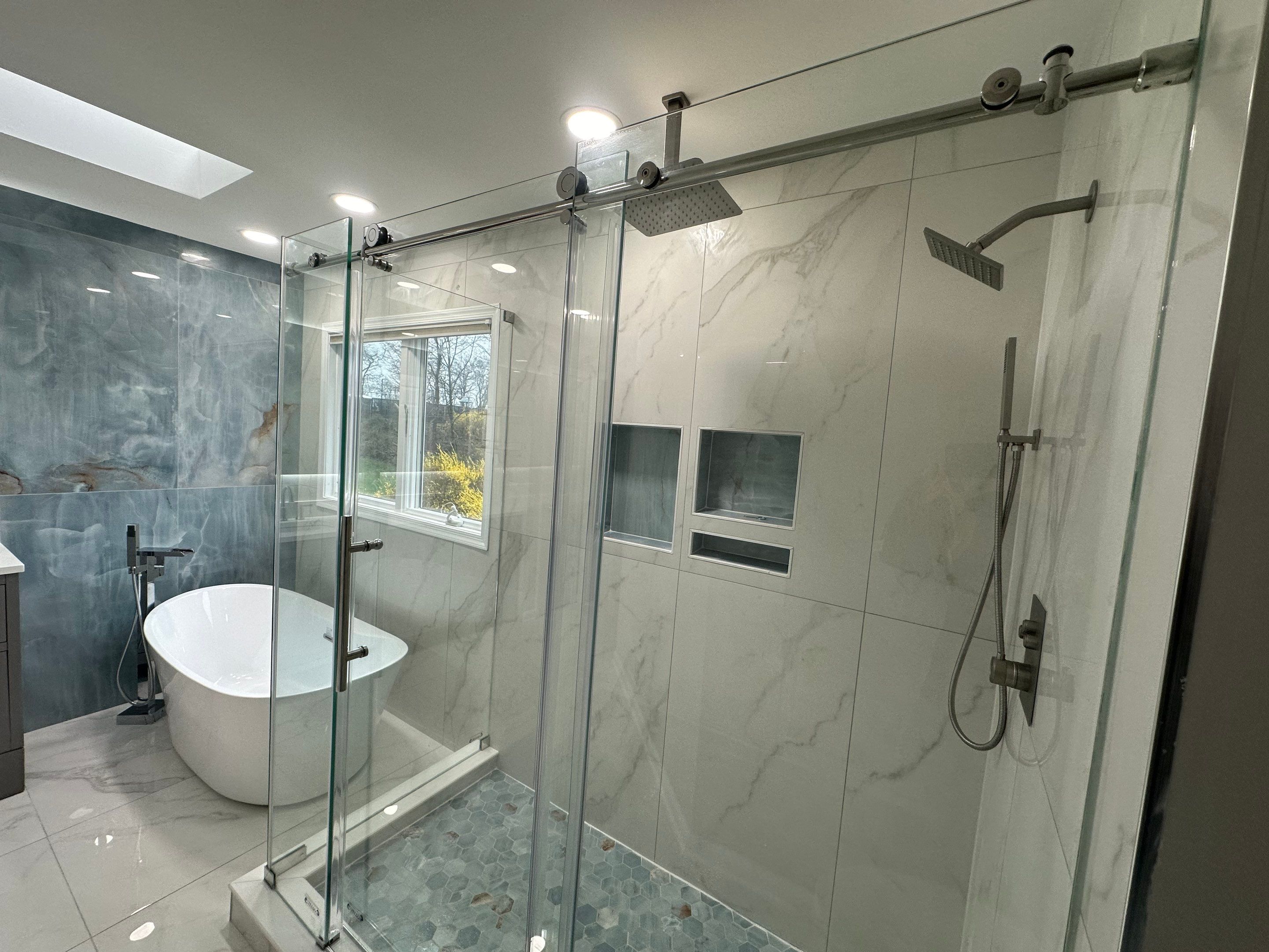 Bathroom Remodel using Tile by Home Concepts Construction