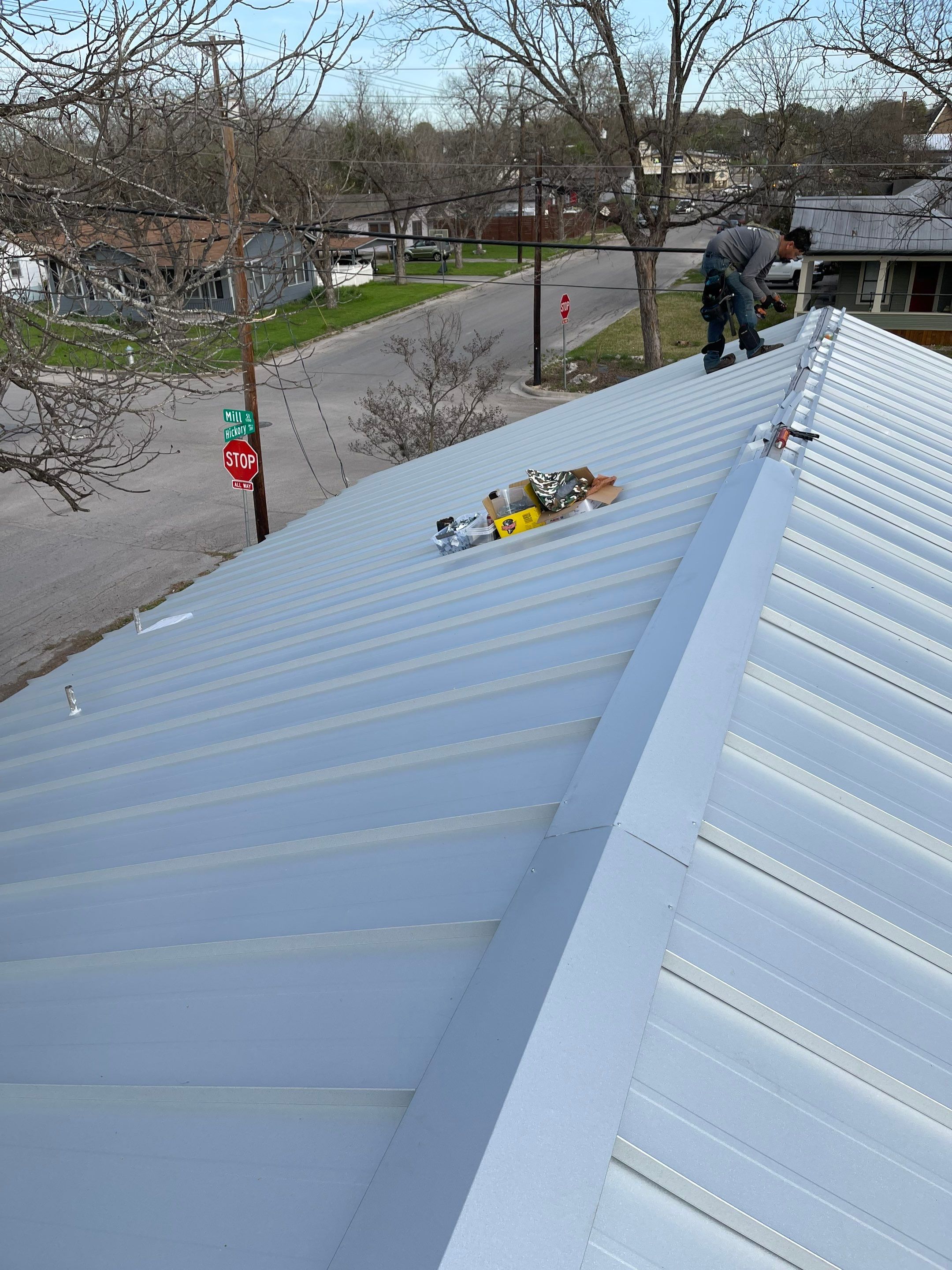 Residential Metal Roof Installation using McElroy Metal by Premier Roofing and Contracting